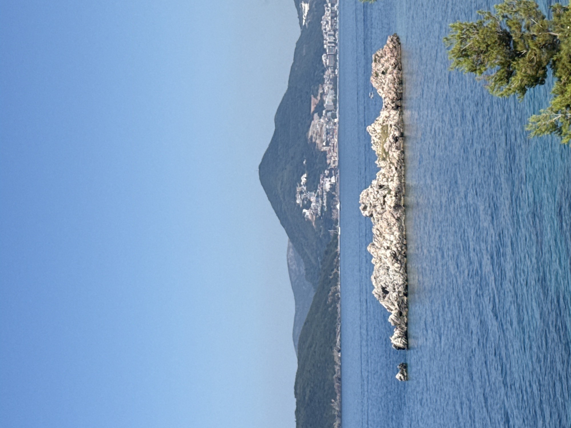 Sveti Stefan and the Adriatic on a calm summer morning