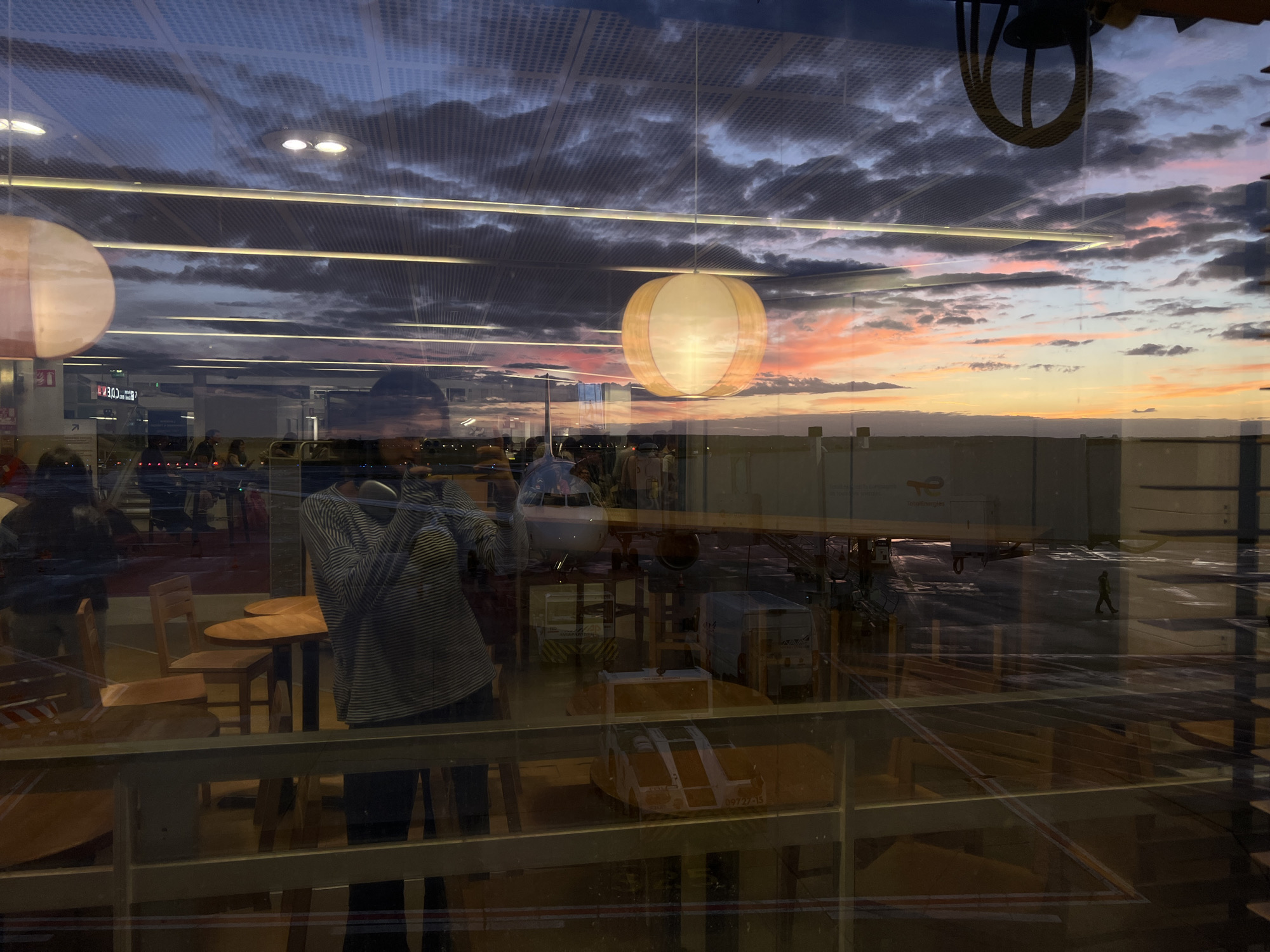 Airport terminal reflections captured during sunset in France