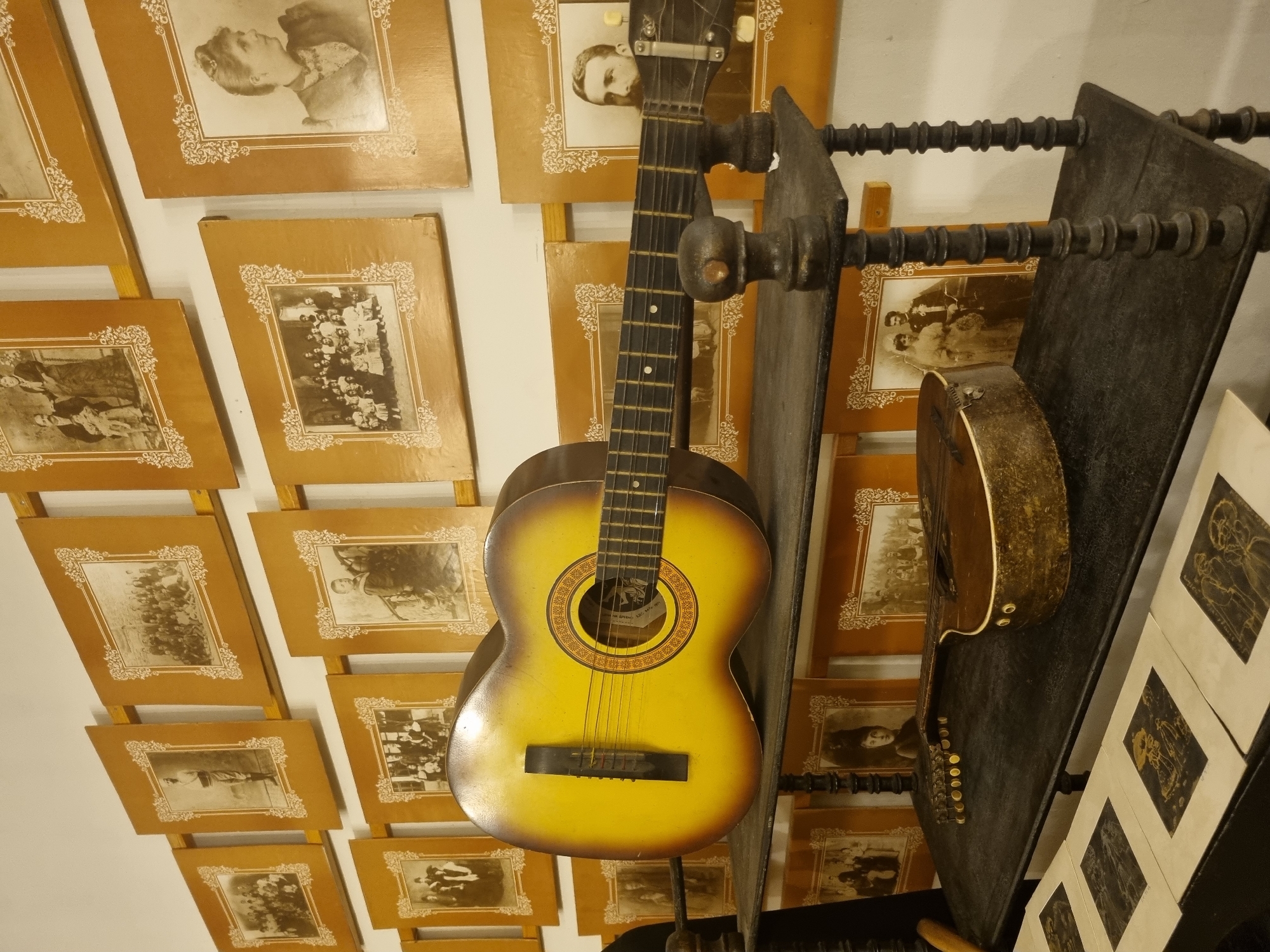 Vintage guitar exhibit observed at Bulgarian museum display