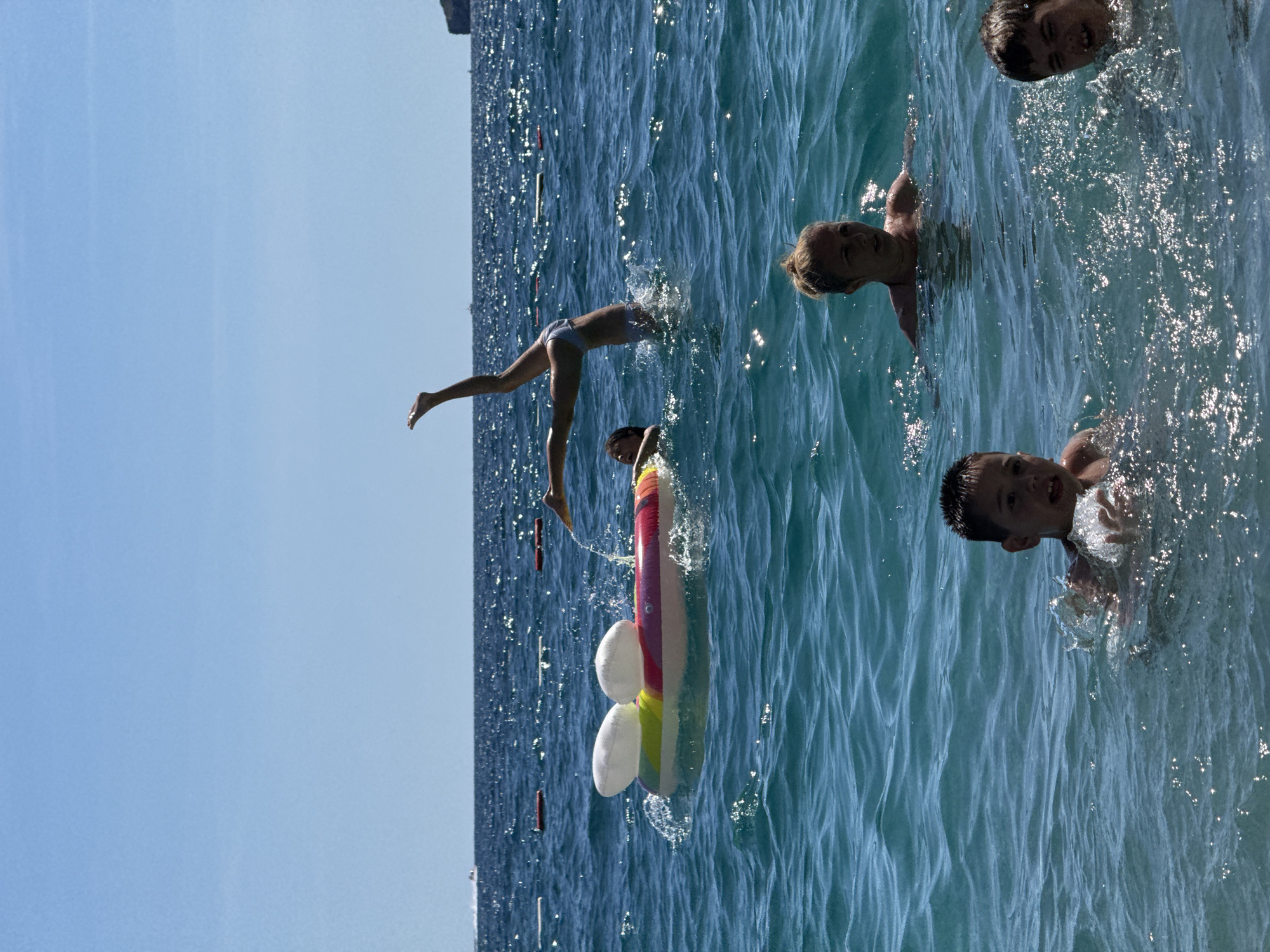 Summer beach day draws swimmers to Montenegro's Adriatic coast