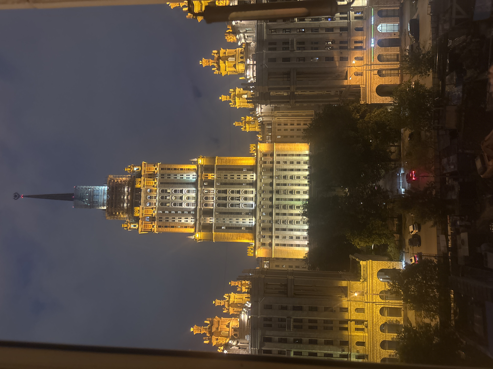 Moscow Stalinist skyscraper glowing at night