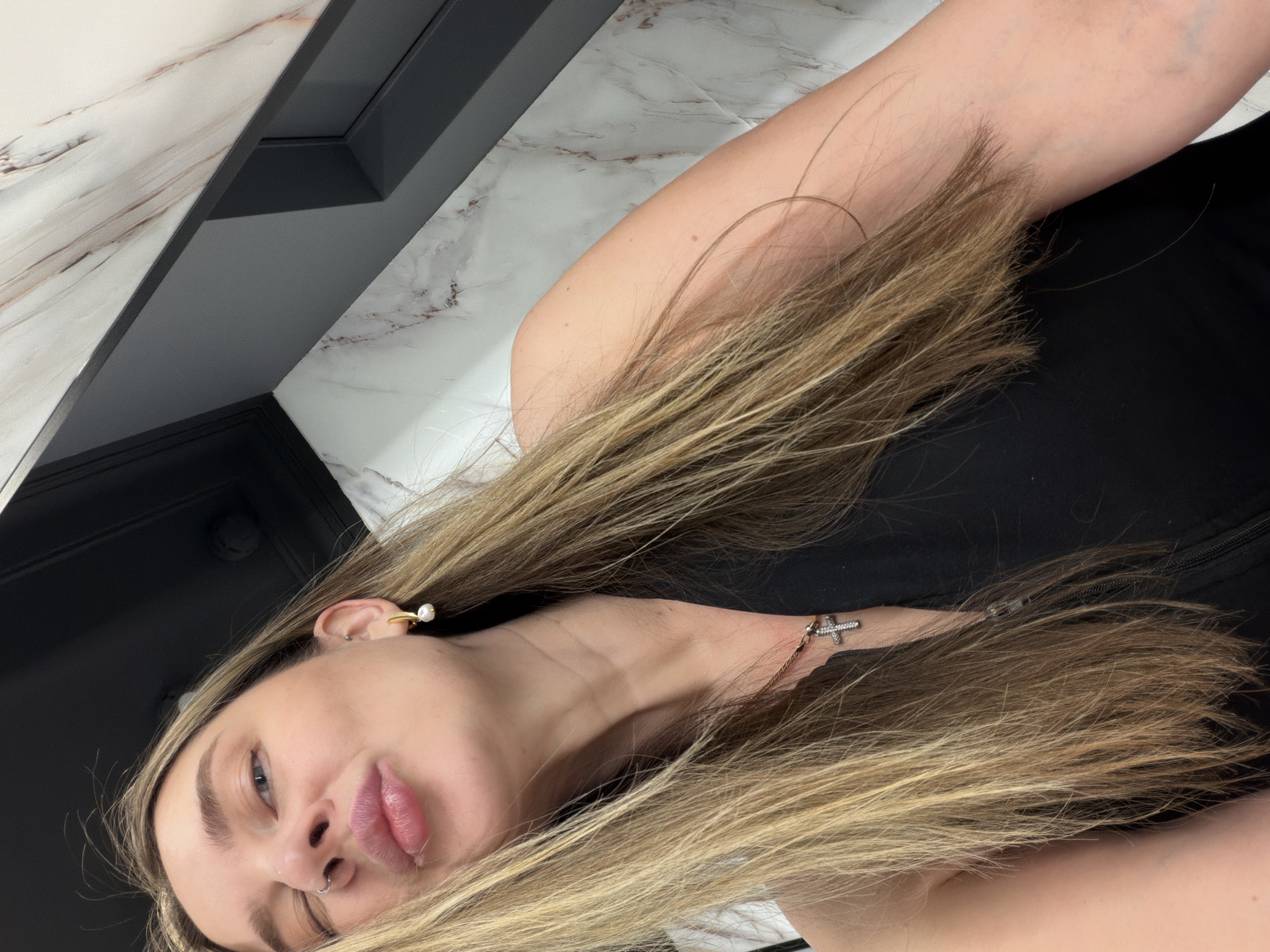 Woman takes bathroom selfies in upscale Moscow venue