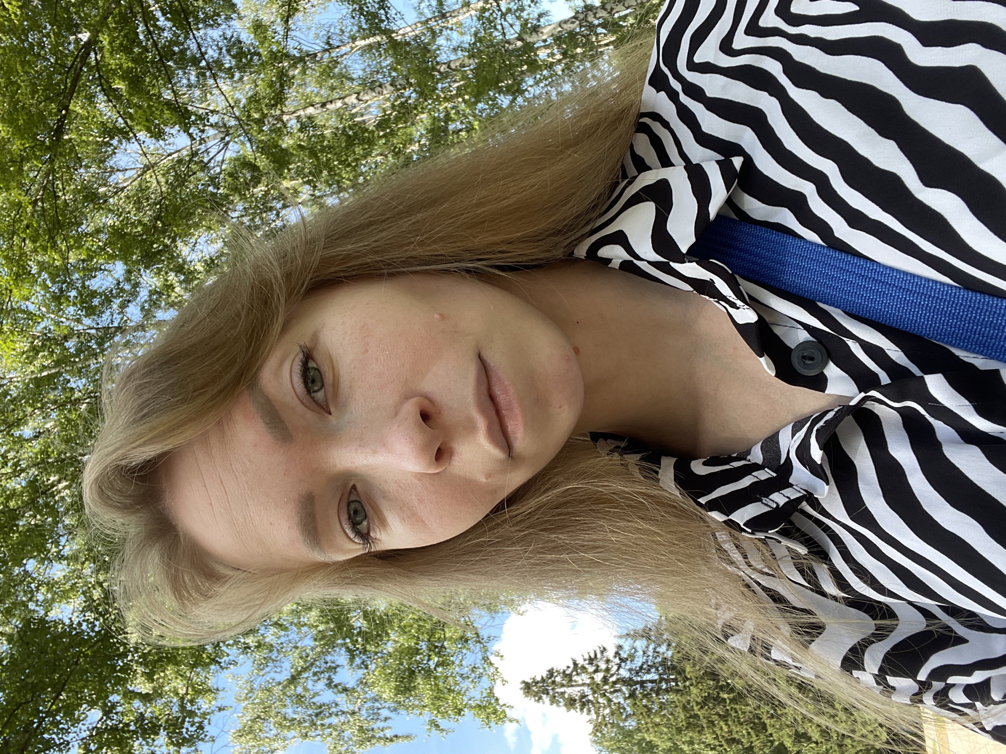 Park afternoon in Perm: selfies, birch trees, and a small child