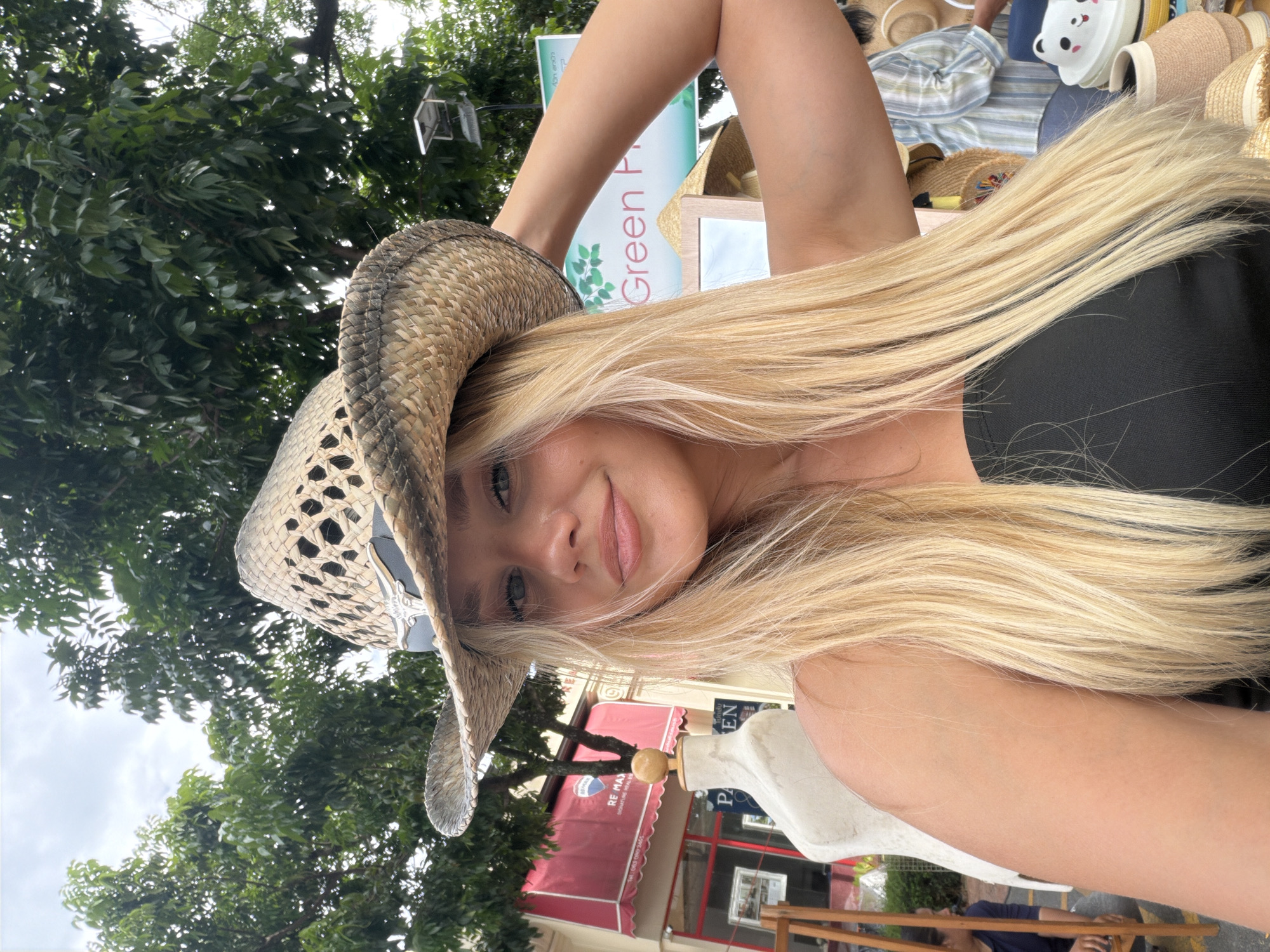 Selfie series at a Choeng Thale market, straw hat and black outfit