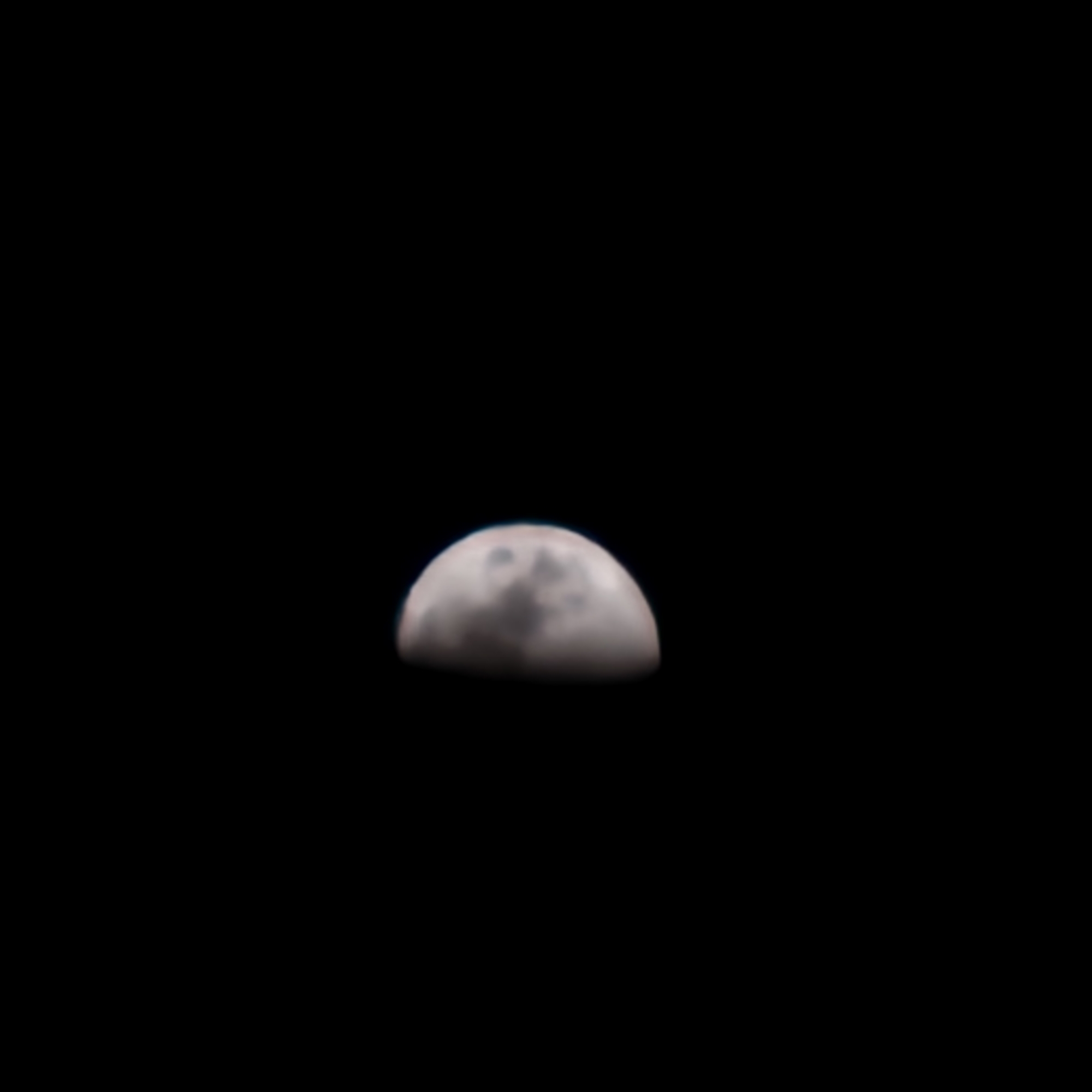 Gibbous moon over El Perelló, surface detail visible