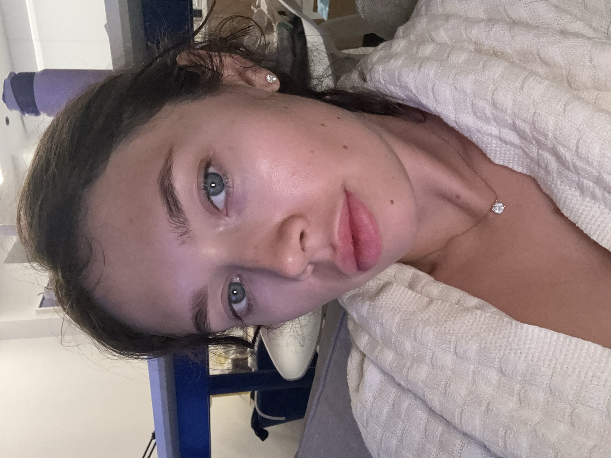 Woman takes selfies wearing diamond jewelry in Cyprus