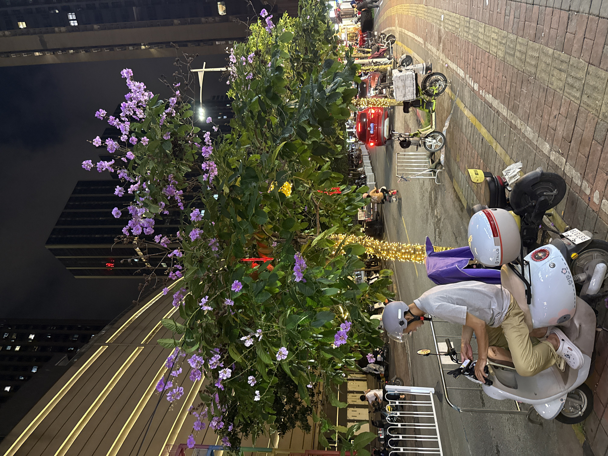 Nighttime commercial district activity captured in Haizhu District
