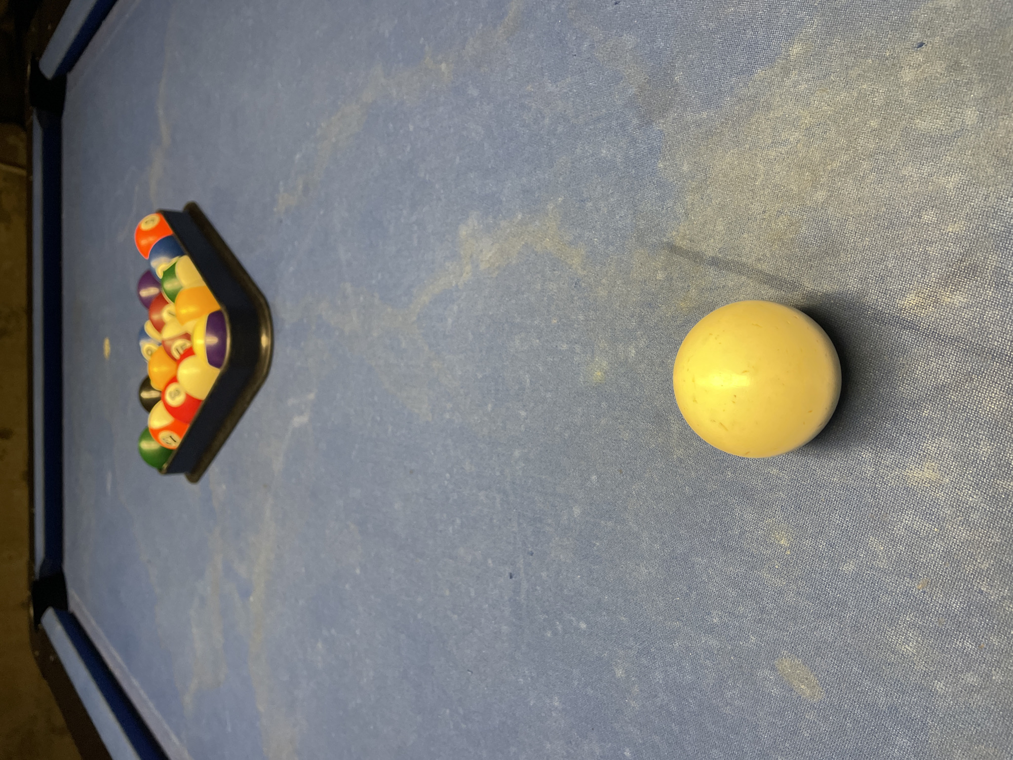 Evening pool game documented at Budapest restaurant district
