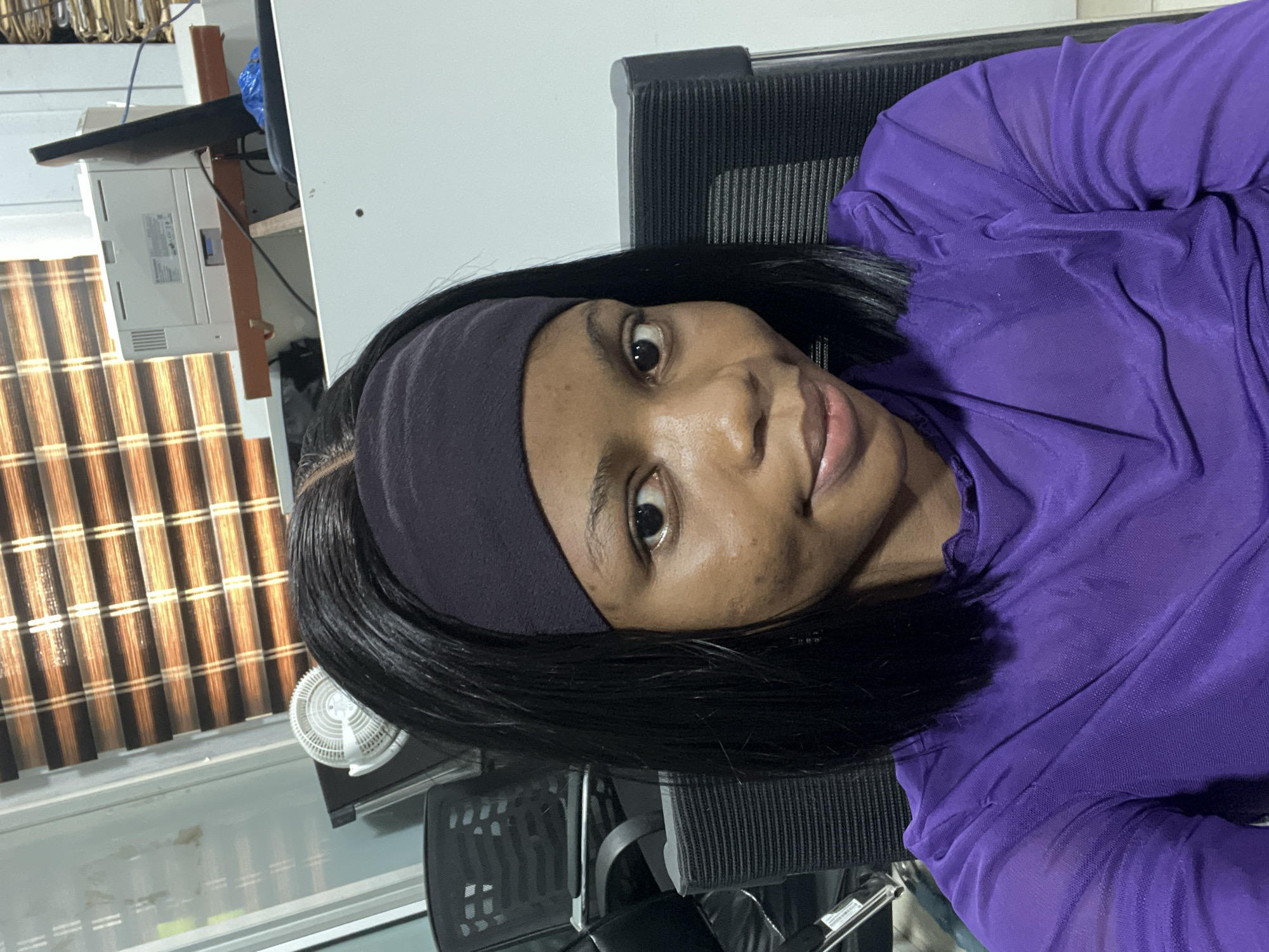 Woman photographed at office workspace in Ikeja, Nigeria