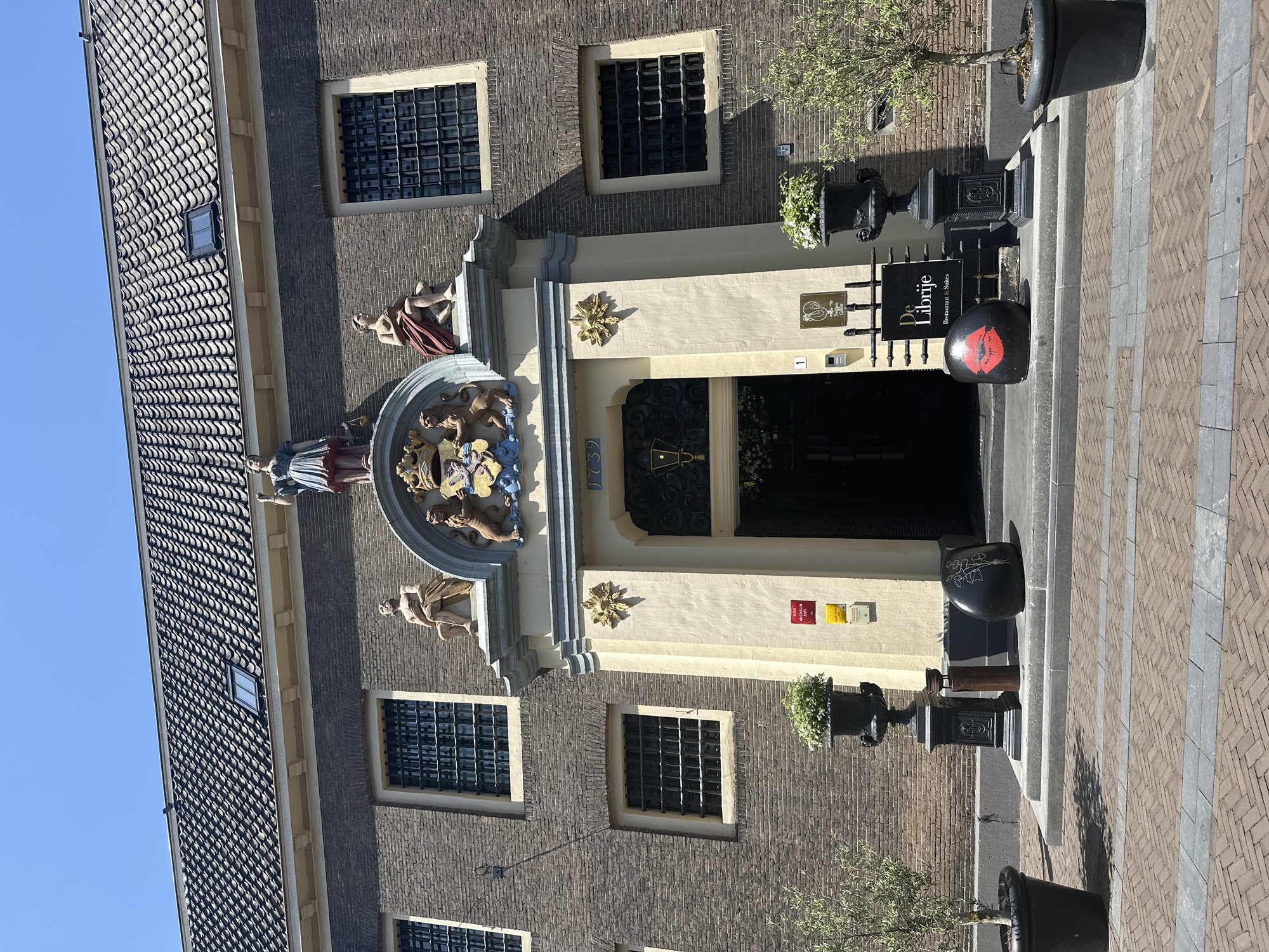 Zwolle city streets and canals on a bright summer morning