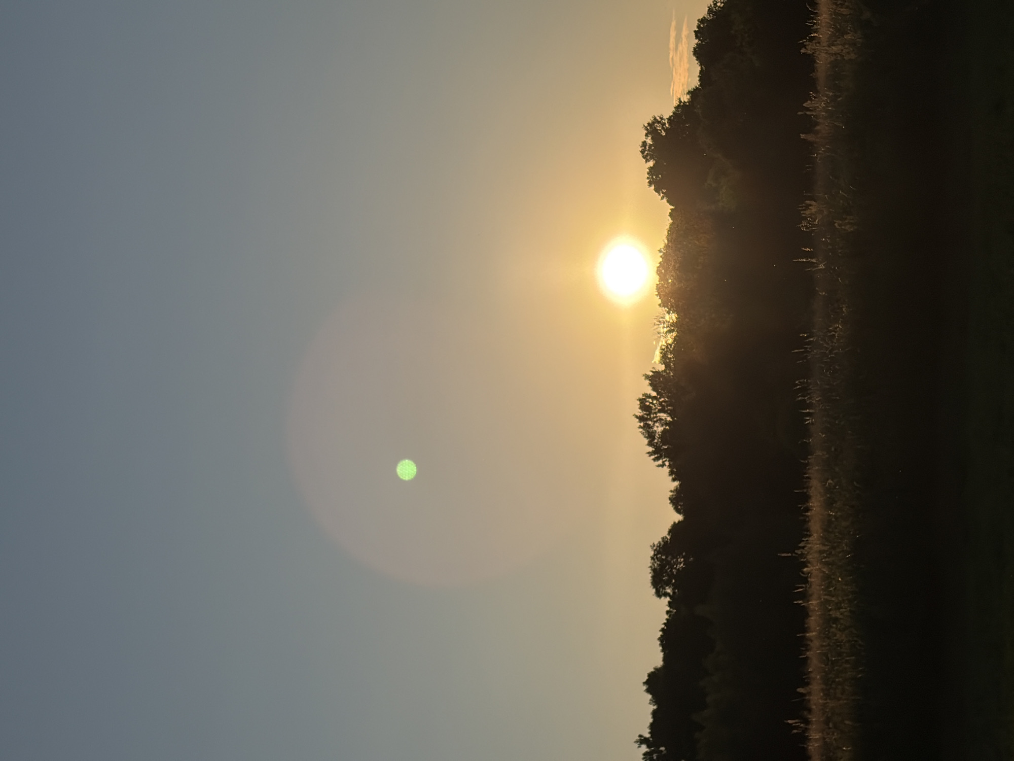 Sunset over Kraków's countryside and a clifftop historic complex