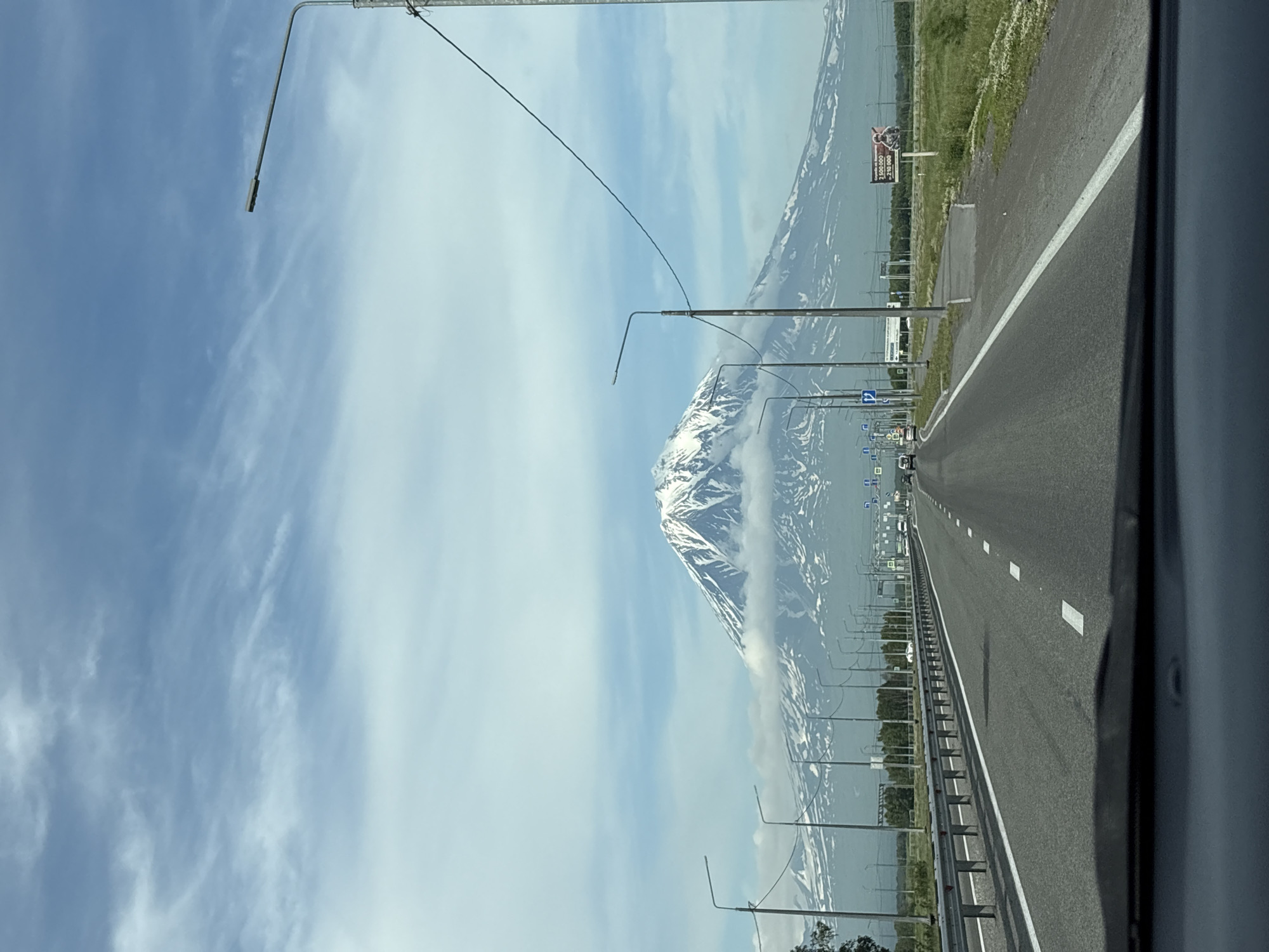 Road trip toward Petropavlovsk with Kamchatka volcanoes ahead