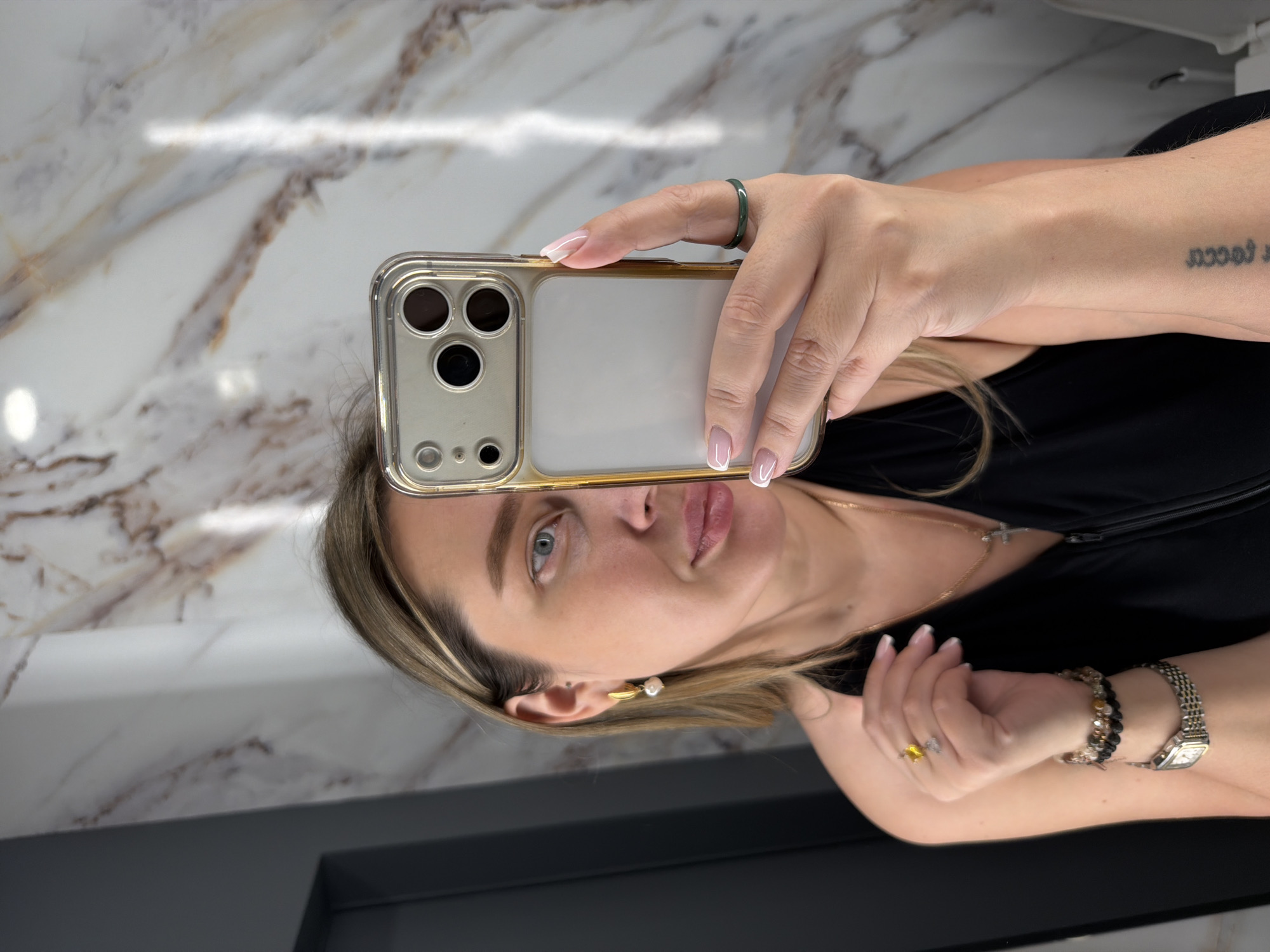 Woman takes bathroom selfies in Moscow indoor location