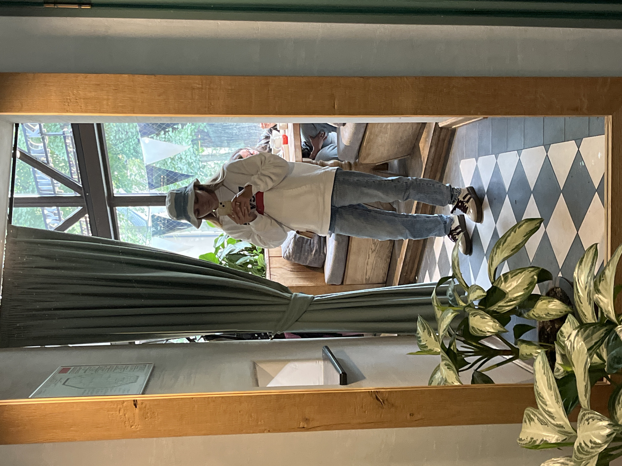 Café terrace and mirror selfie, Kaliningrad afternoon