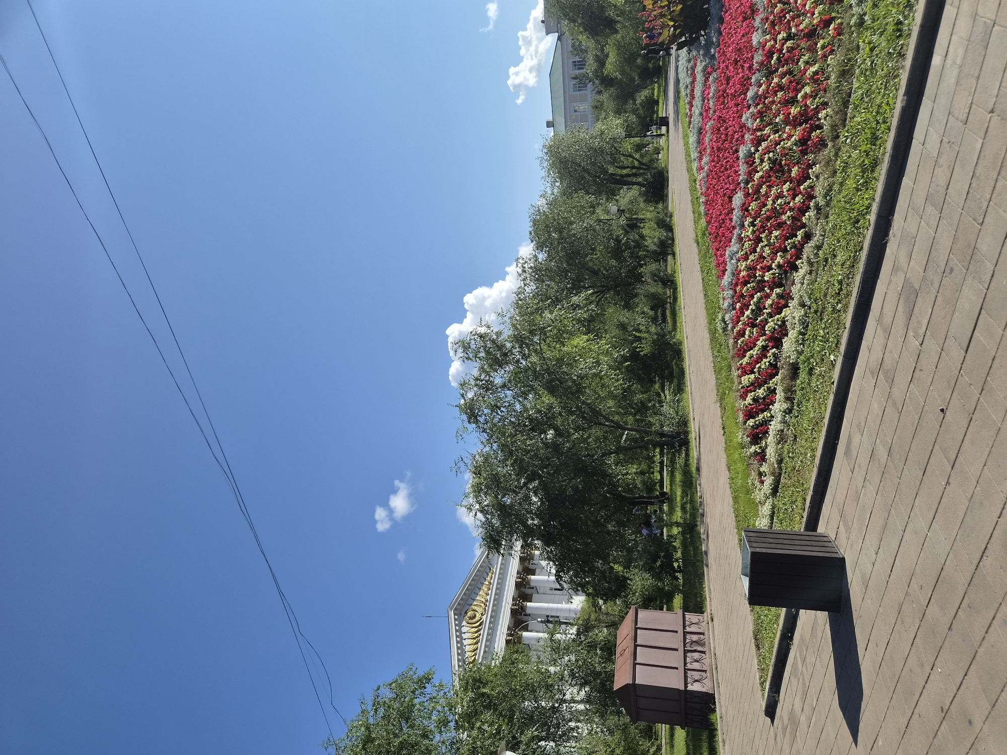 Russian city square on a sunny morning, event preparations underway