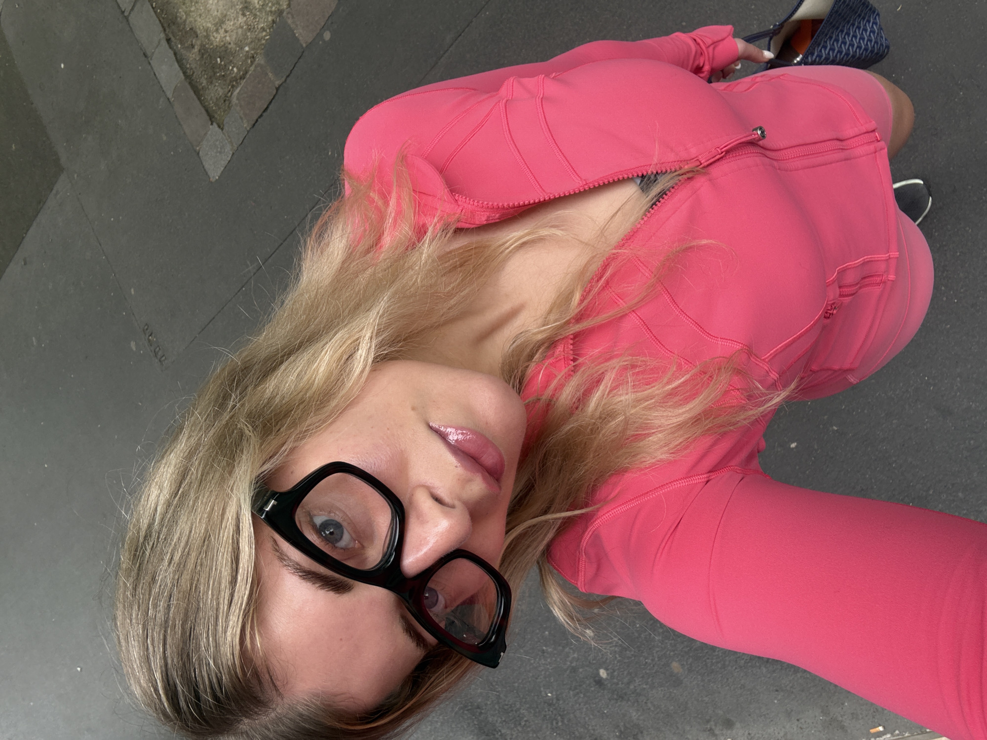 Woman in Pink Athletic Wear Photographed in Paris