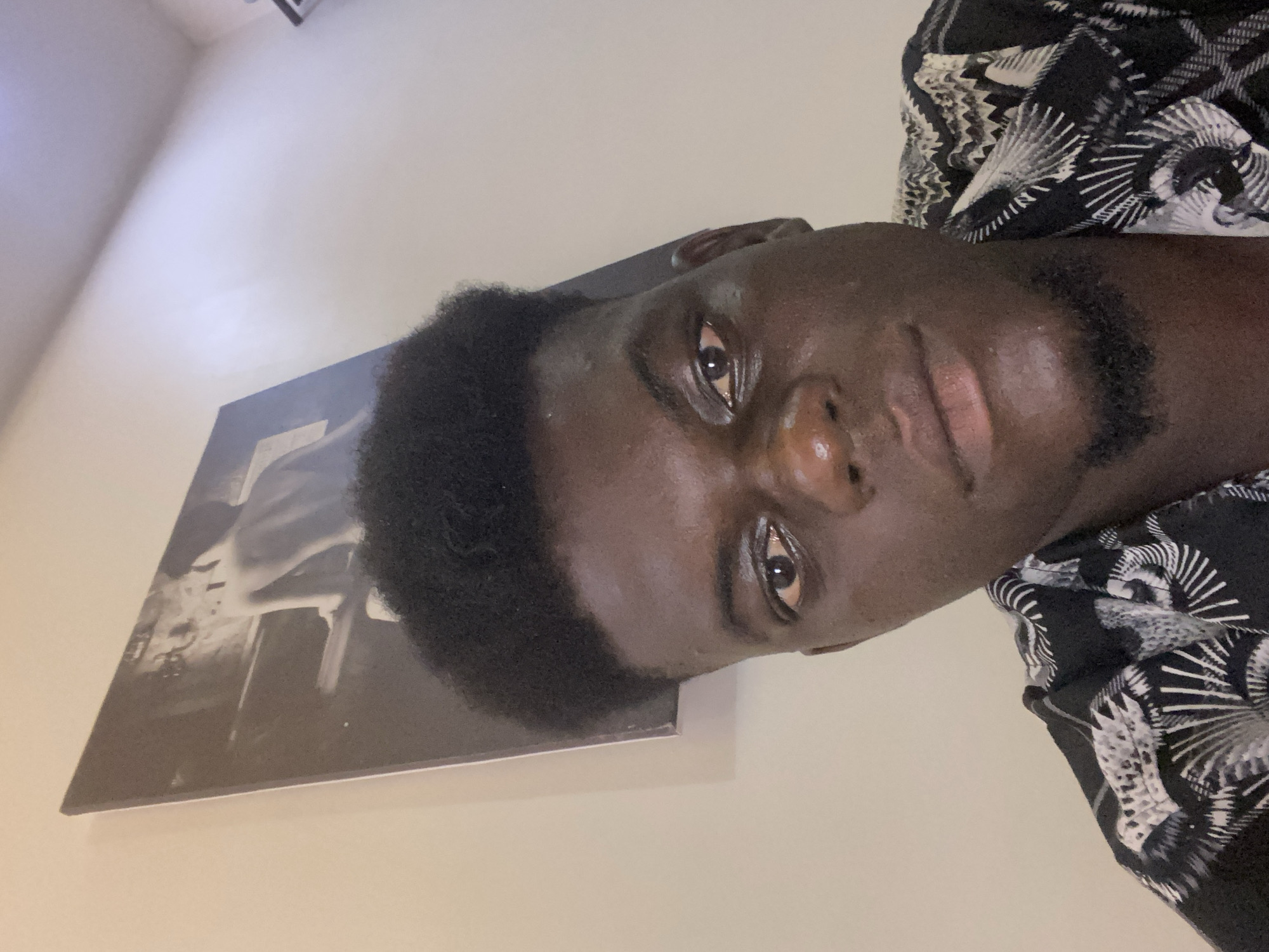 Man photographed twice indoors during evening hours