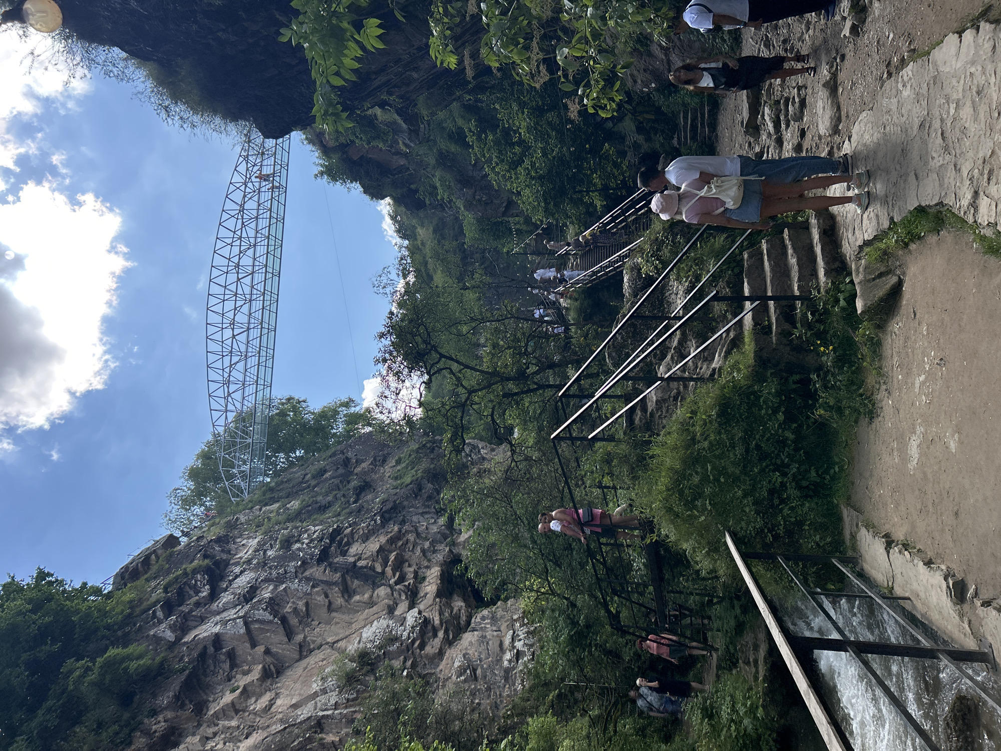 Glass bridge and waterfall gorge at Krasny Kurgan, Russia