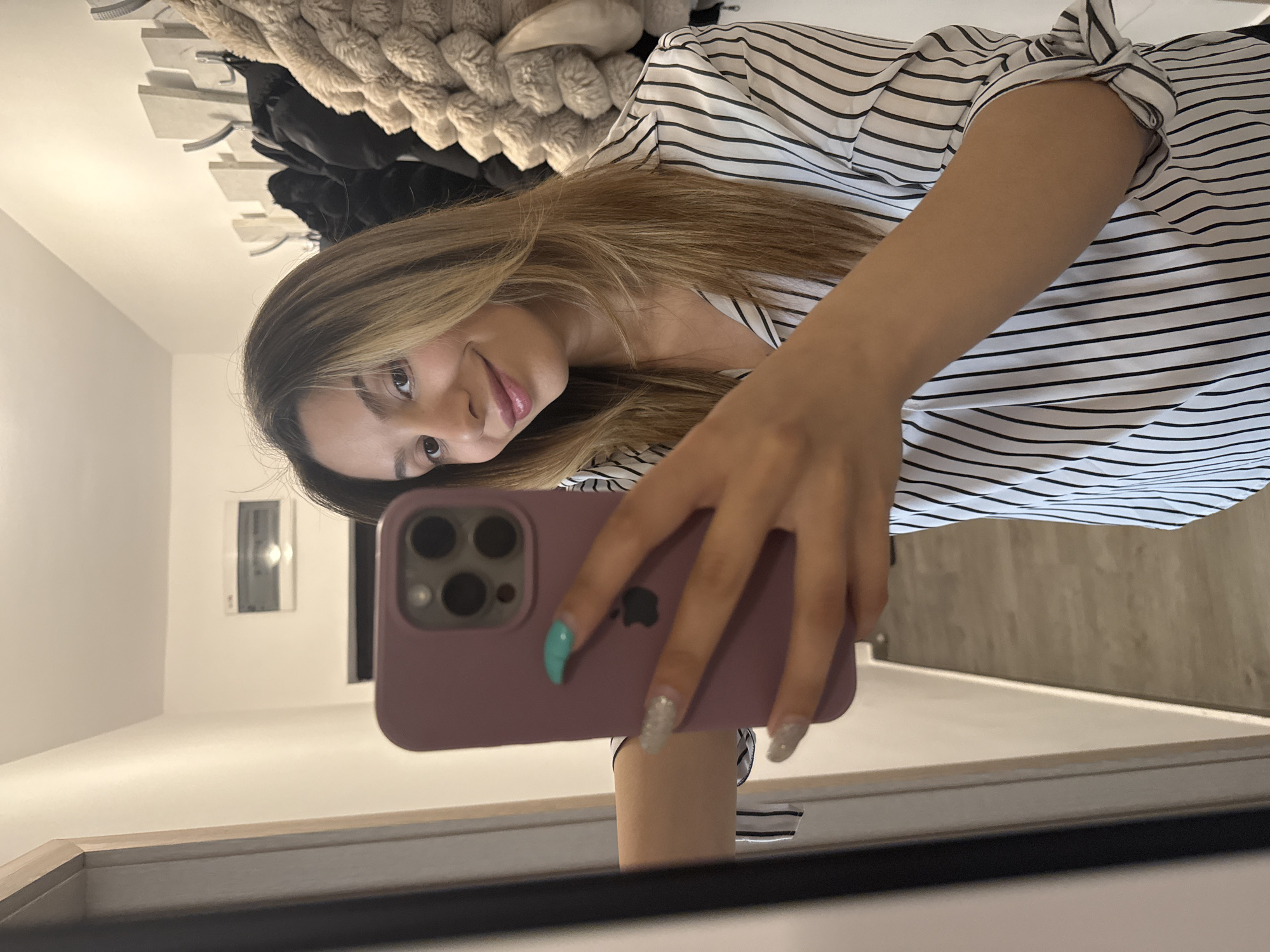 Woman takes mirror selfie at home in Stara Zagora