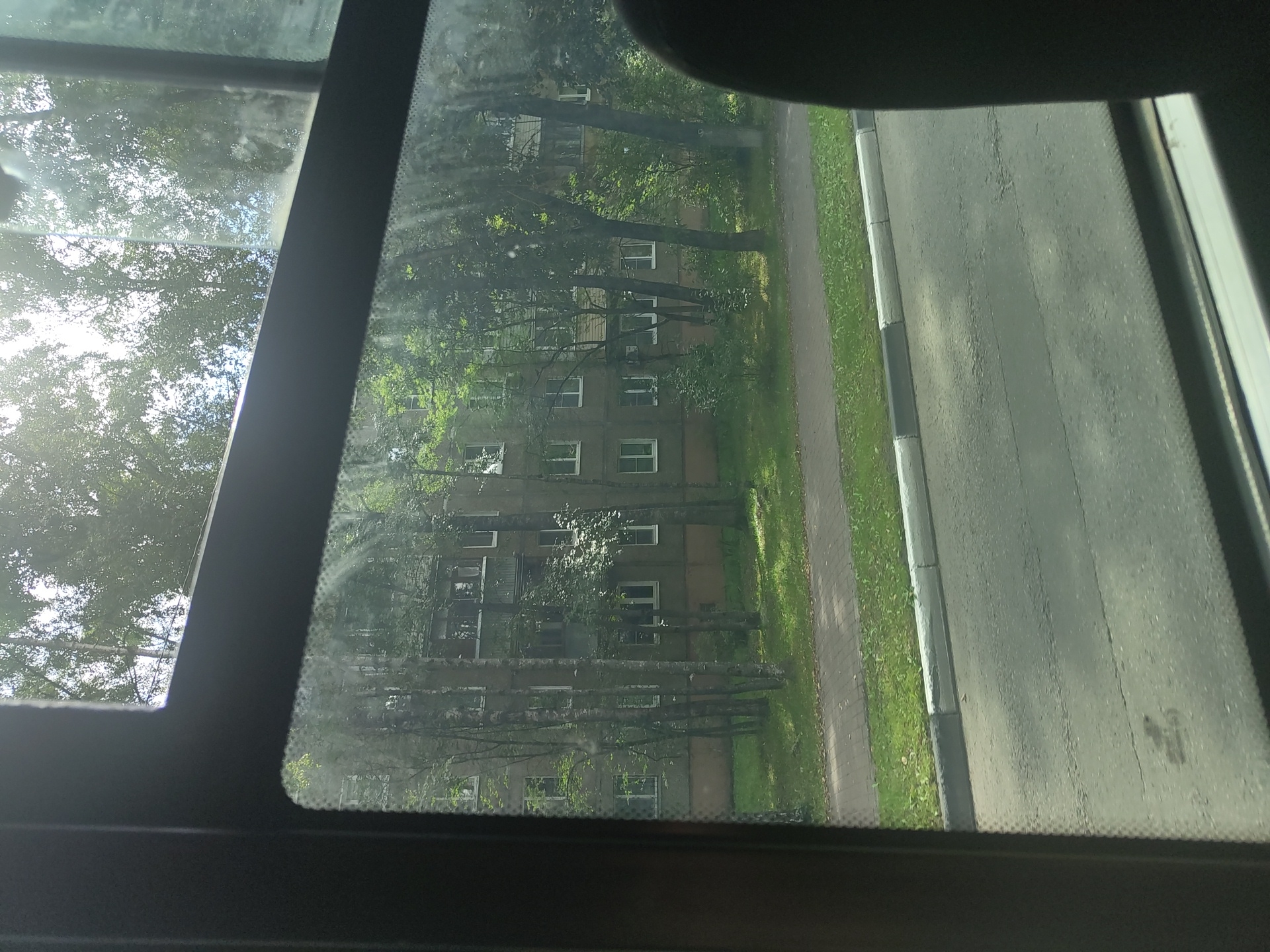 Street-level scenes from Ramenskoye: trucks, apartments, and public art