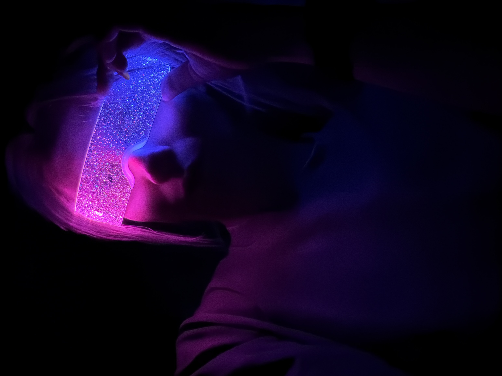Person wears glowing novelty glasses in Chaikovsky, Russia