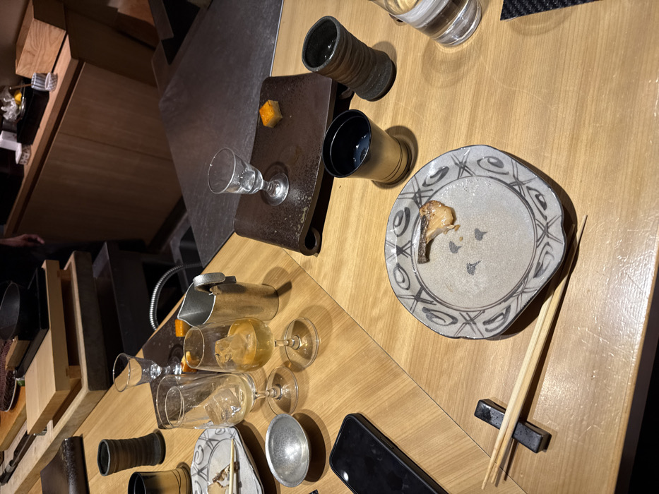 Diner captures table view at Japanese restaurant in Minato