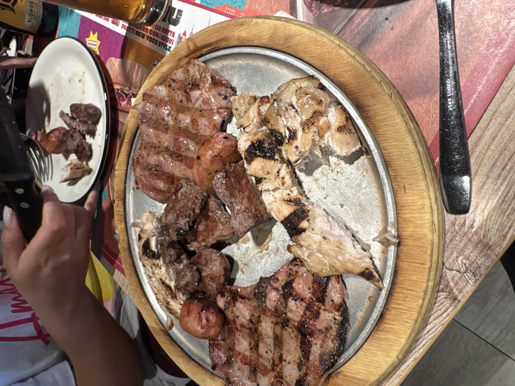 Diner enjoys mixed grill at Rome restaurant