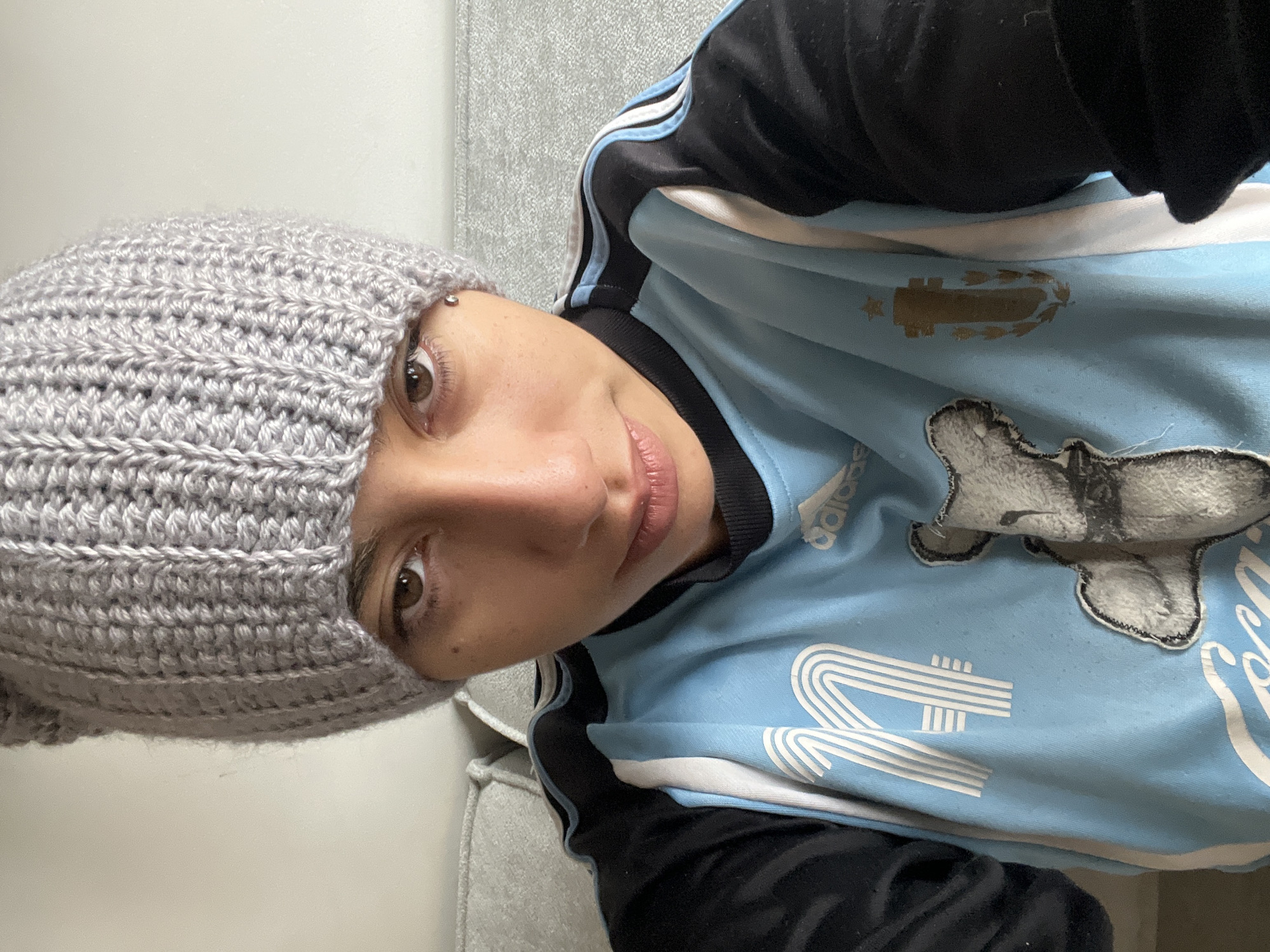 Buenos Aires resident relaxes indoors during autumn afternoon