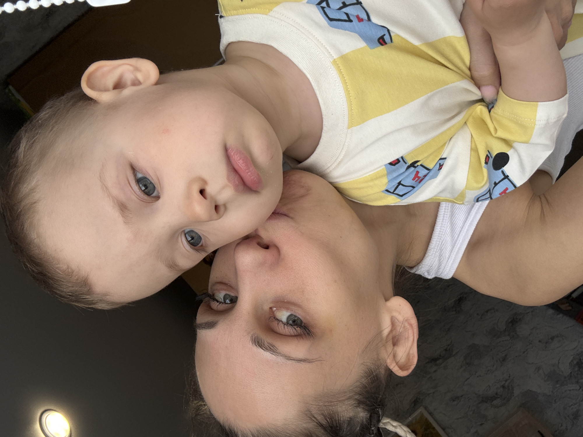 Mother and toddler share quiet morning moments in Rusanovo