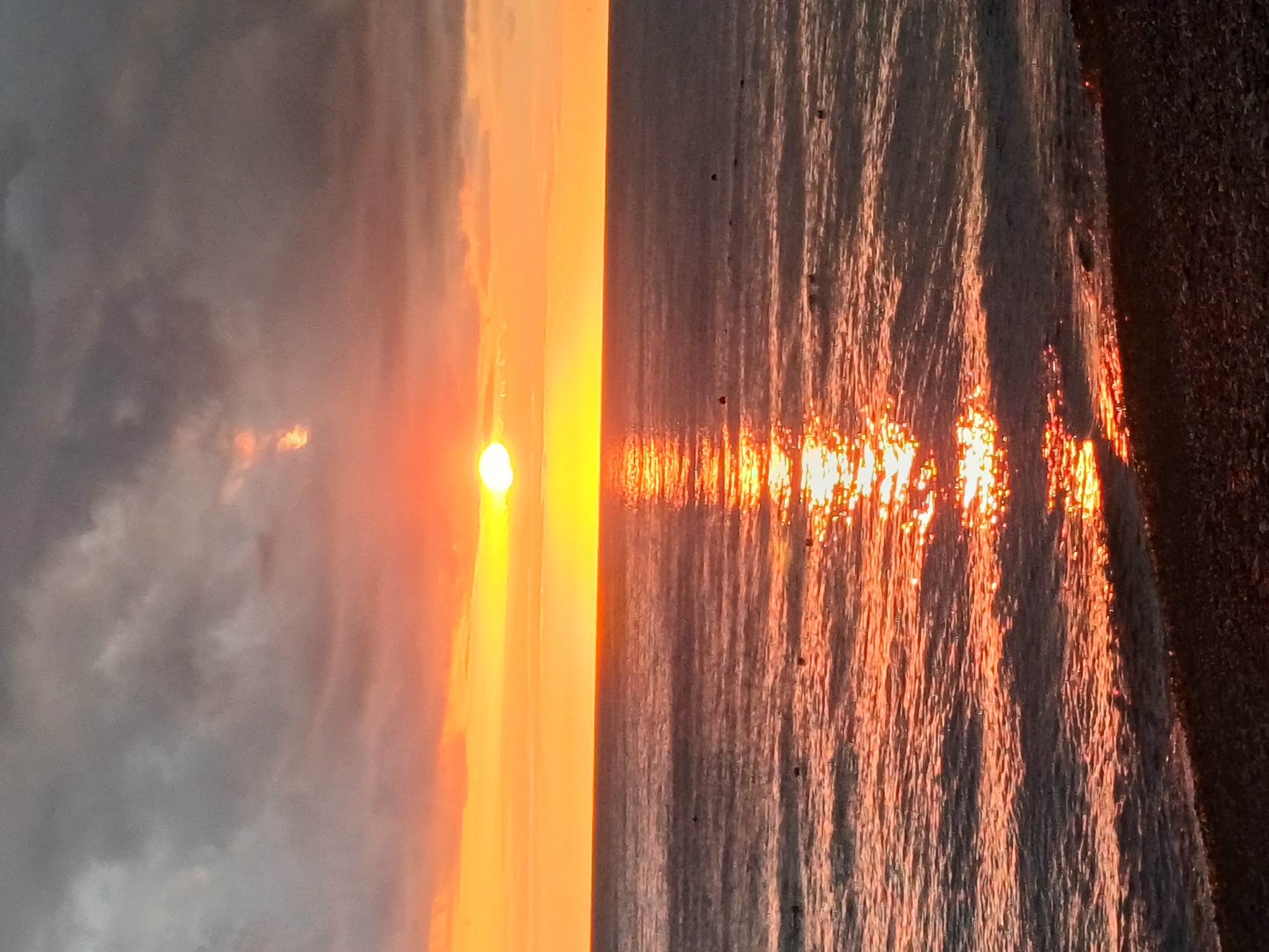 Golden hour on Sochi's pebble beach along the Black Sea