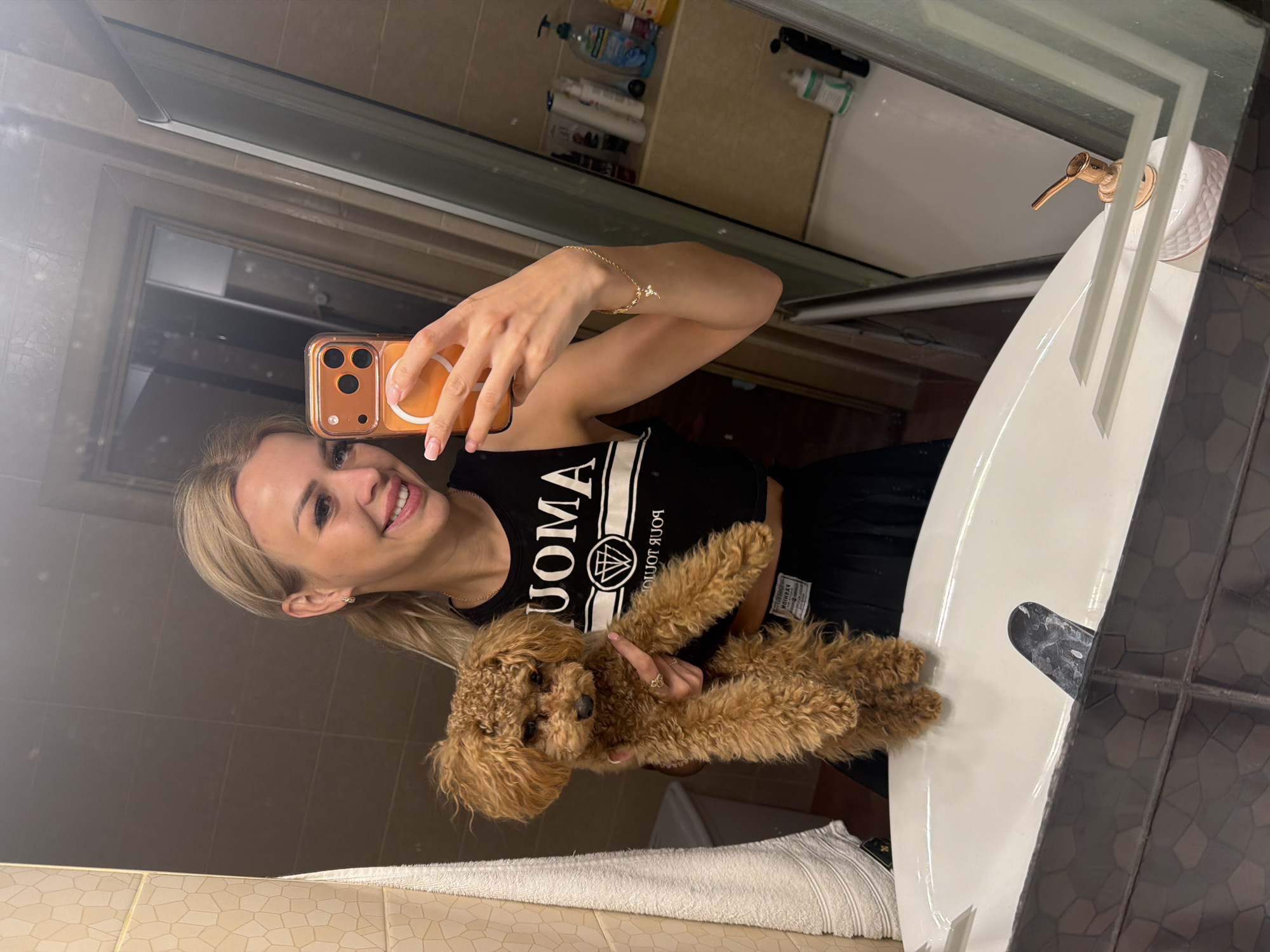 Kyiv evening: bathroom selfies, a poodle, and city streets at sunset