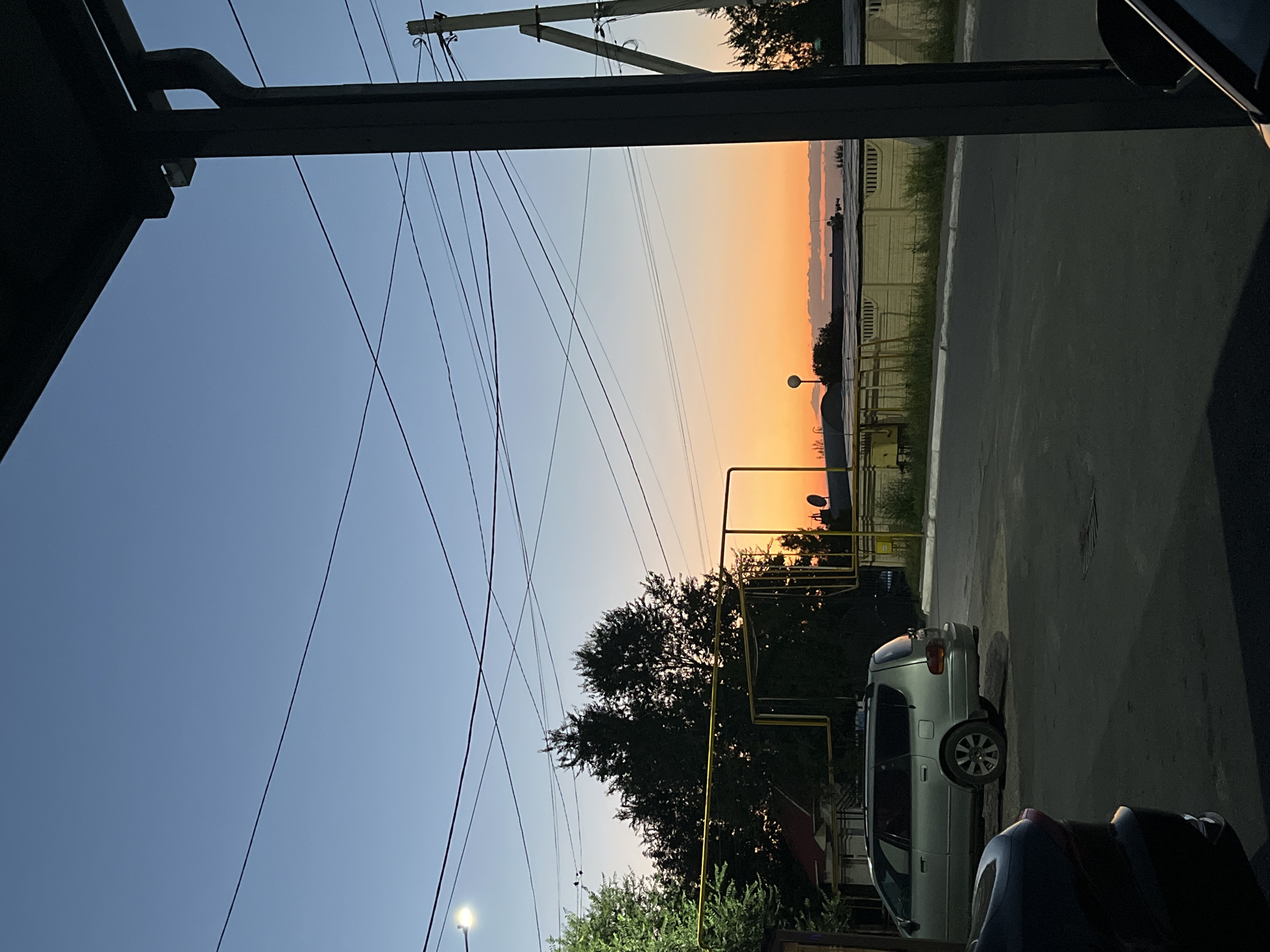Warm sunset gradient over Shymkent, Kazakhstan