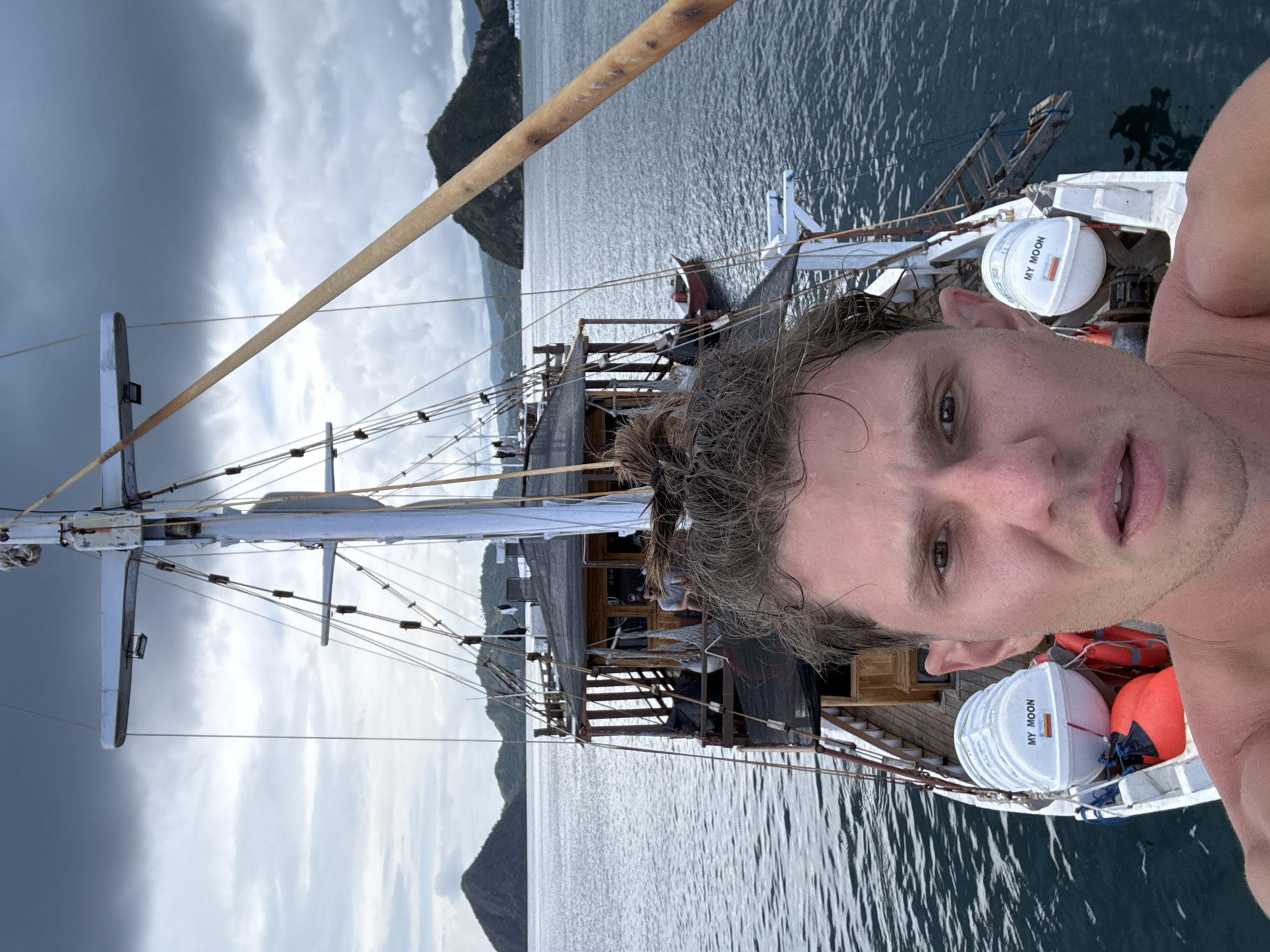 Man photographed on boat bow near Indonesian coast