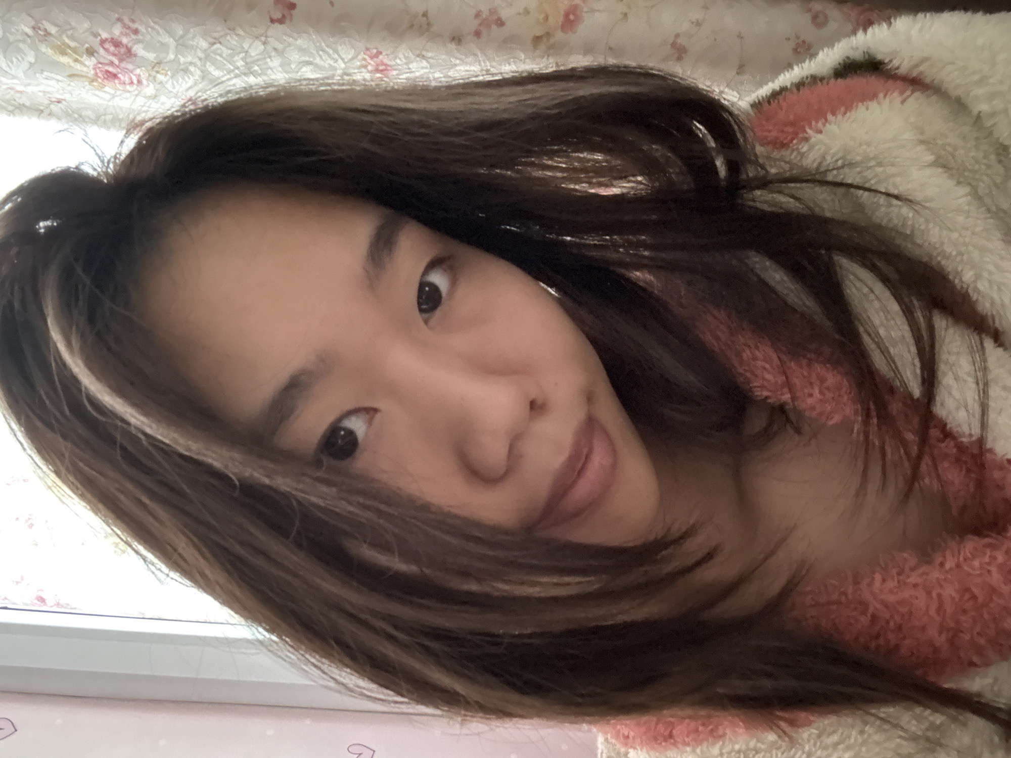 Woman takes bedroom selfie session in Chongqing early morning