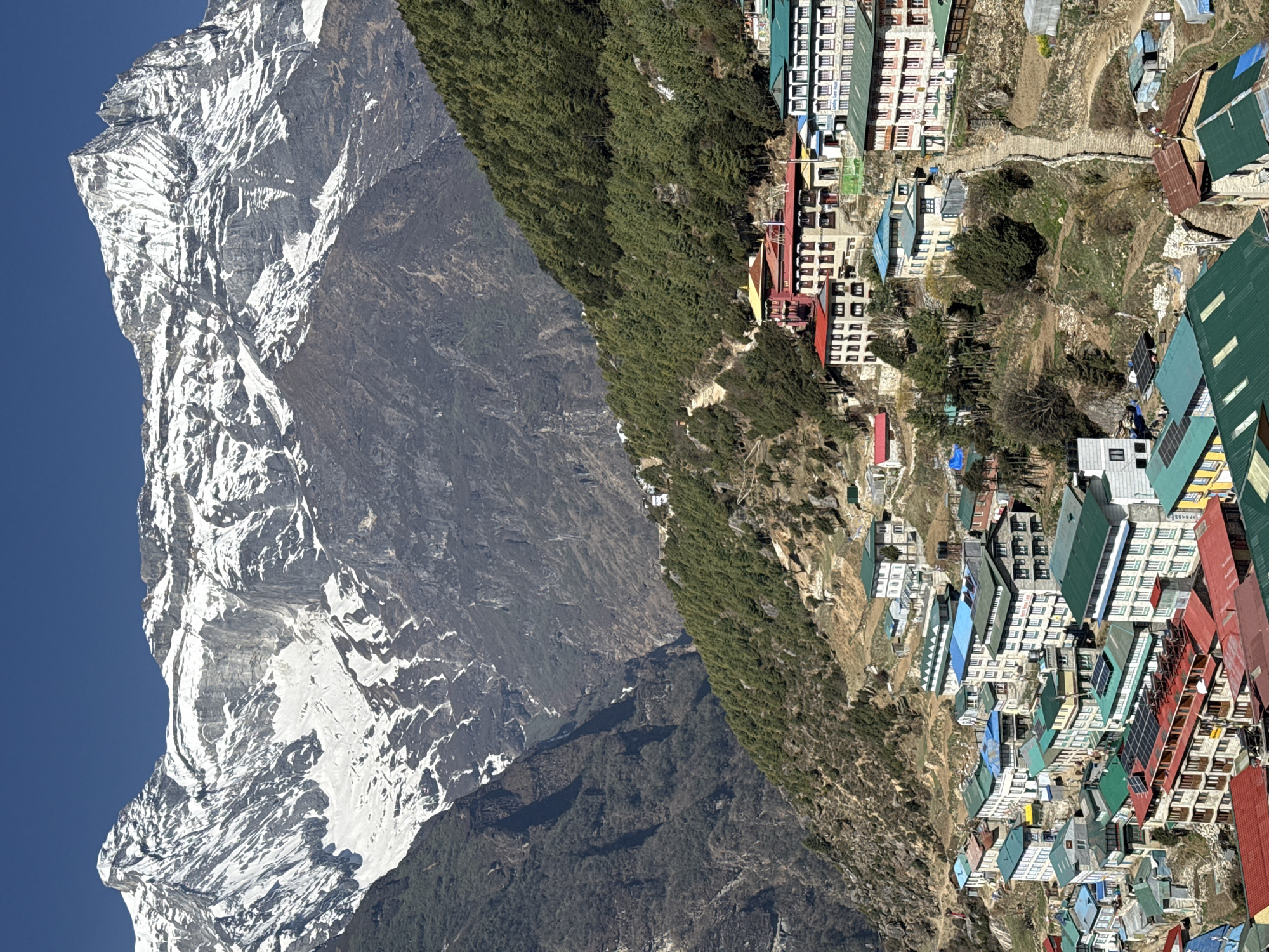 Namche Bazaar photographed against snow-capped Himalayan backdrop