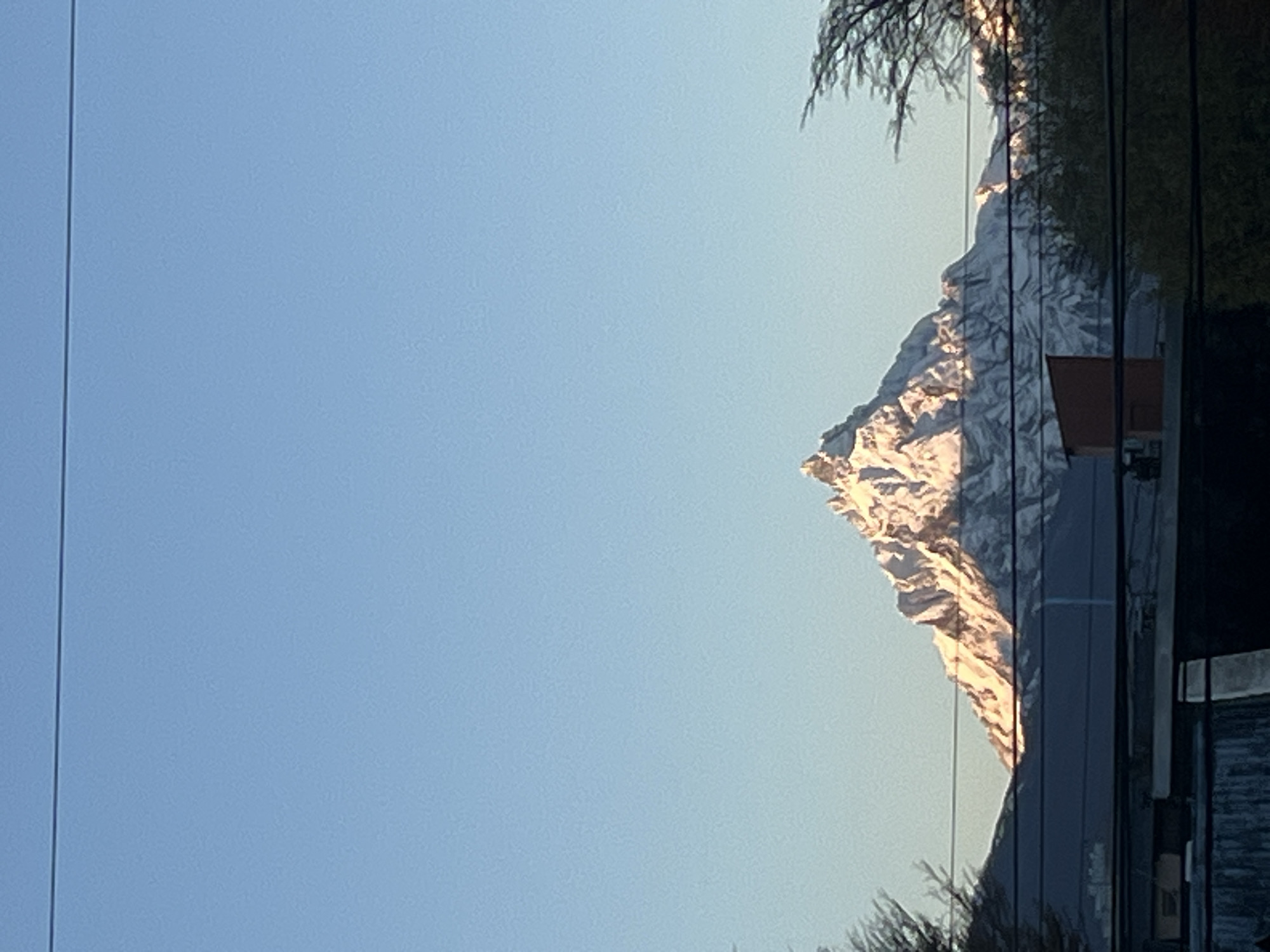 Mountain reflection captured in Ushuaia building windows