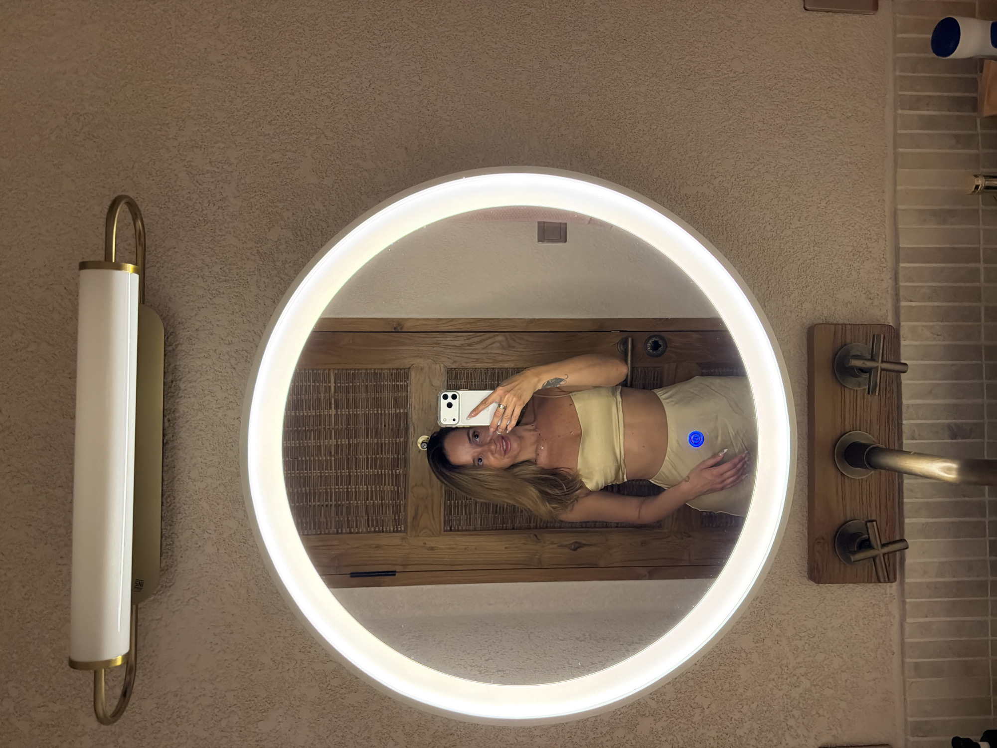 Woman takes selfies in various outfits in Mengwi