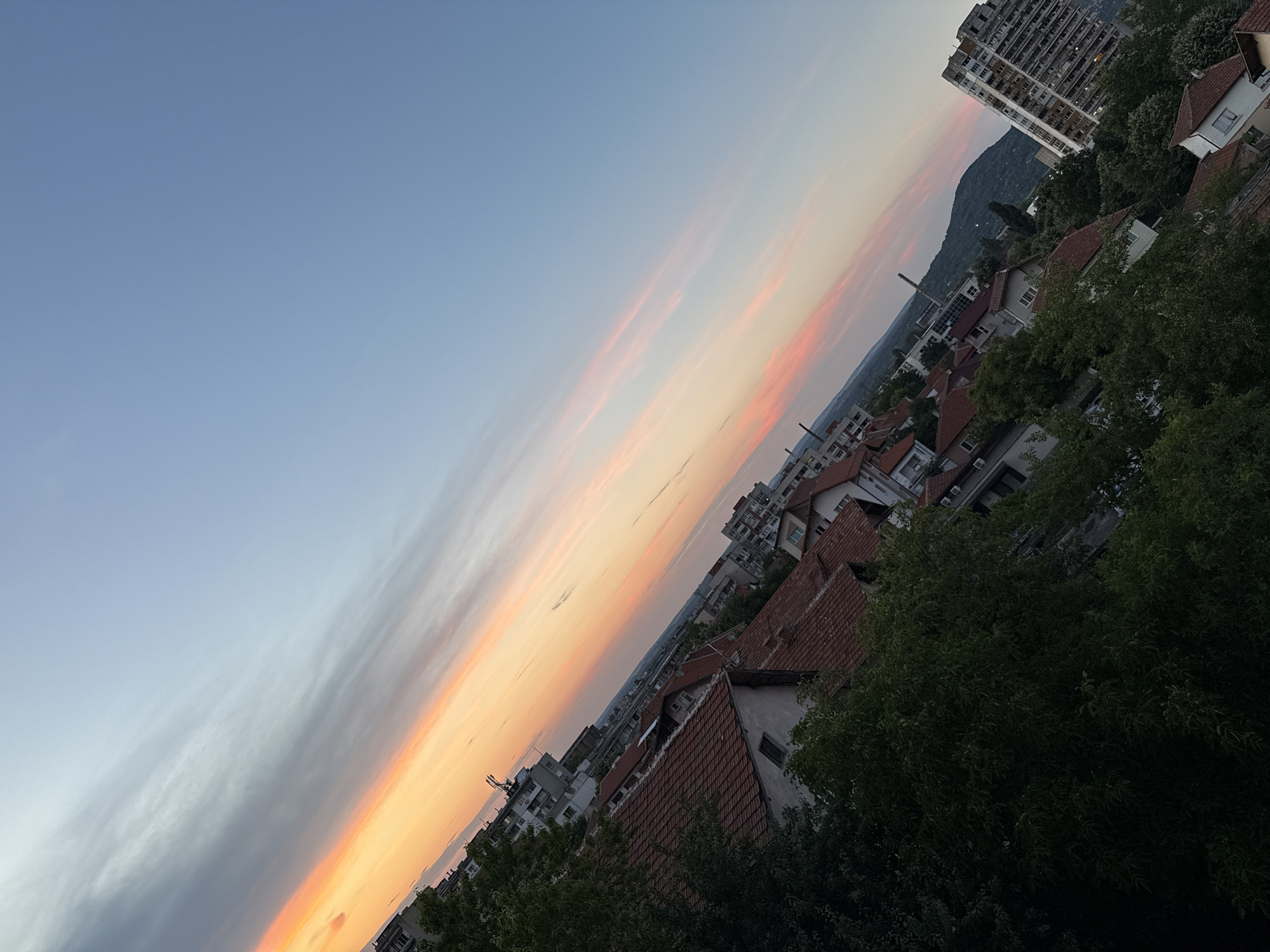 Sunset over Vratsa rooftops, shot from above