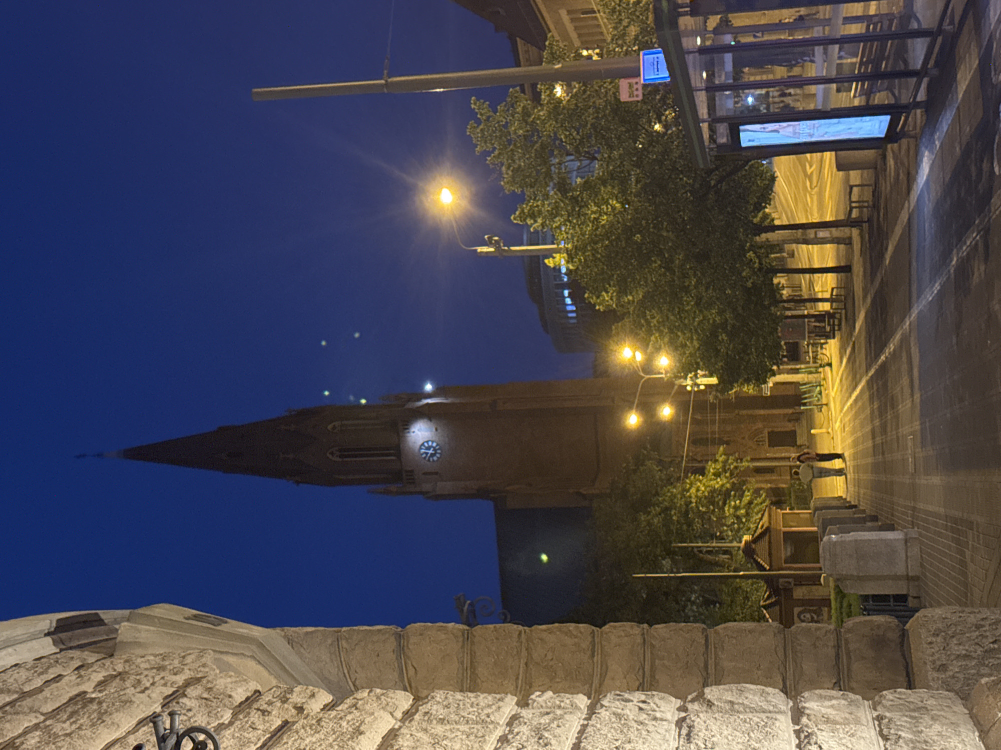 Night street scene captured from elevated view in Poznan