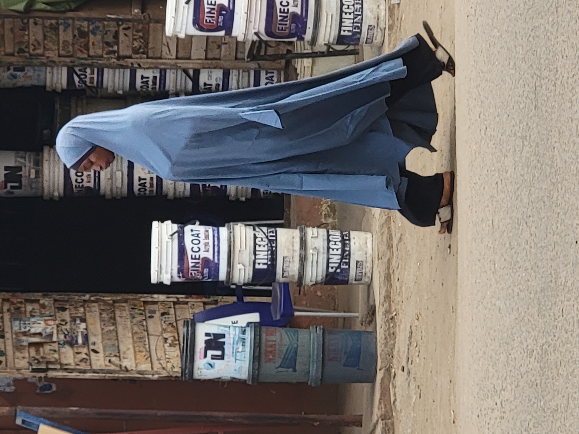 Customers browse building supplies at Maiburiji hardware store