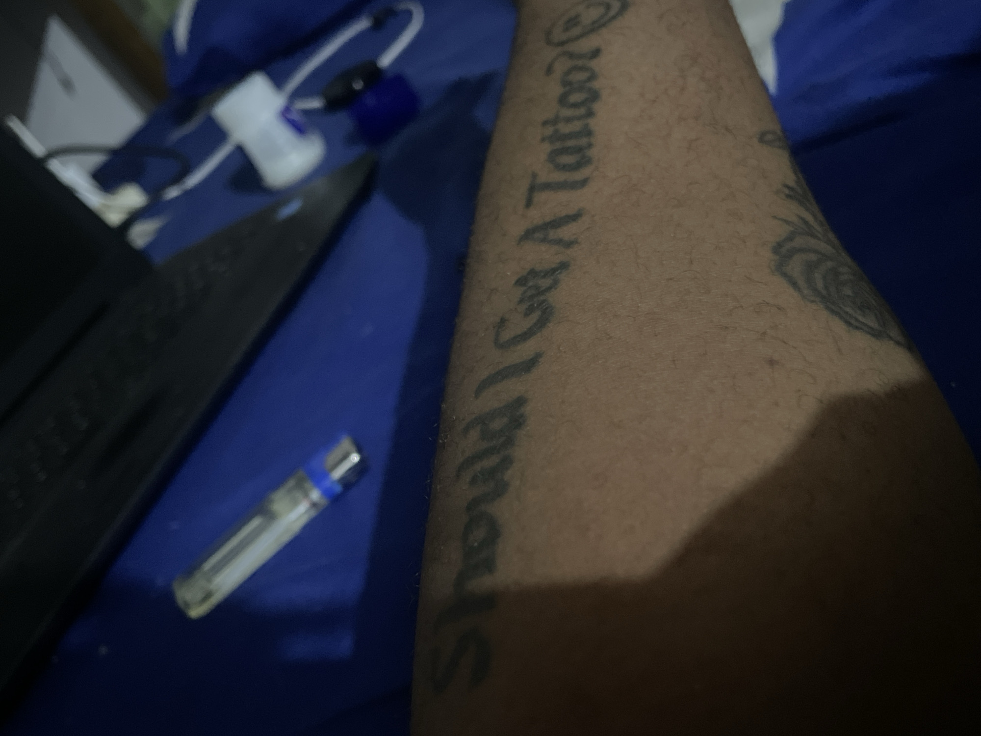 Personal moments captured in Jos: tattoos, lighter, flowers