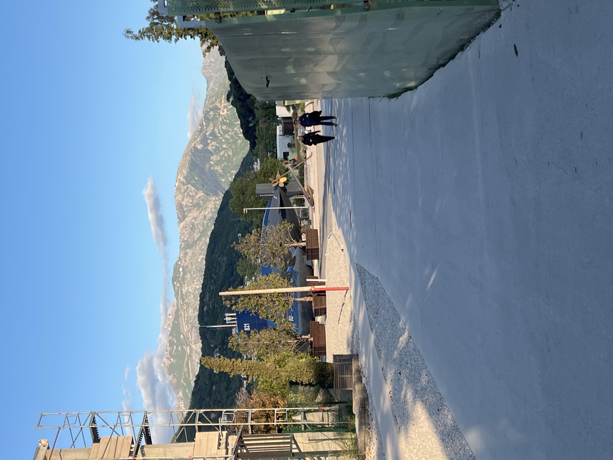 Pedestrians spotted near fiber elephant sculpture in Montenegro village
