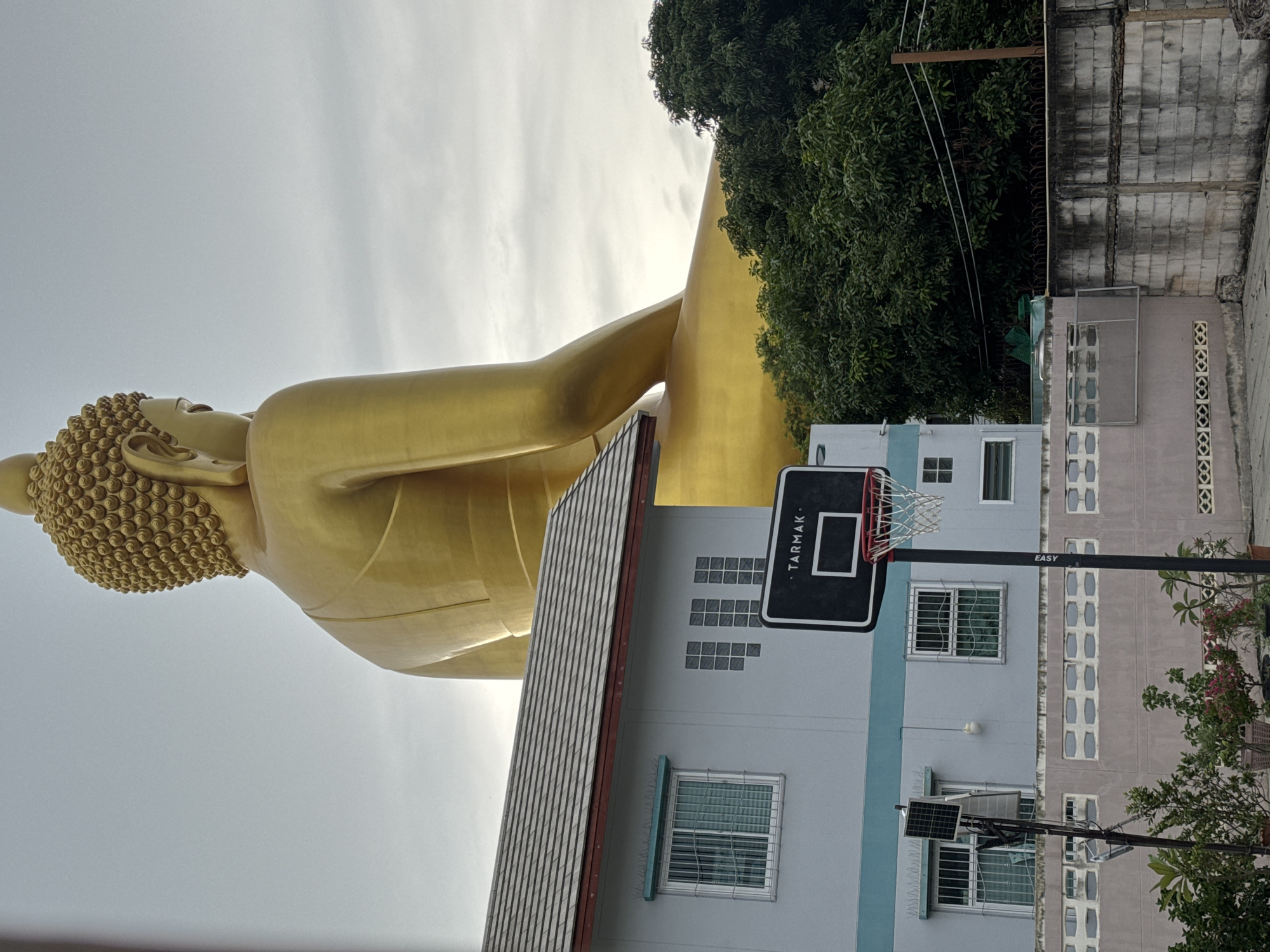Colossal golden Buddha statue looms over Bangkok skyline