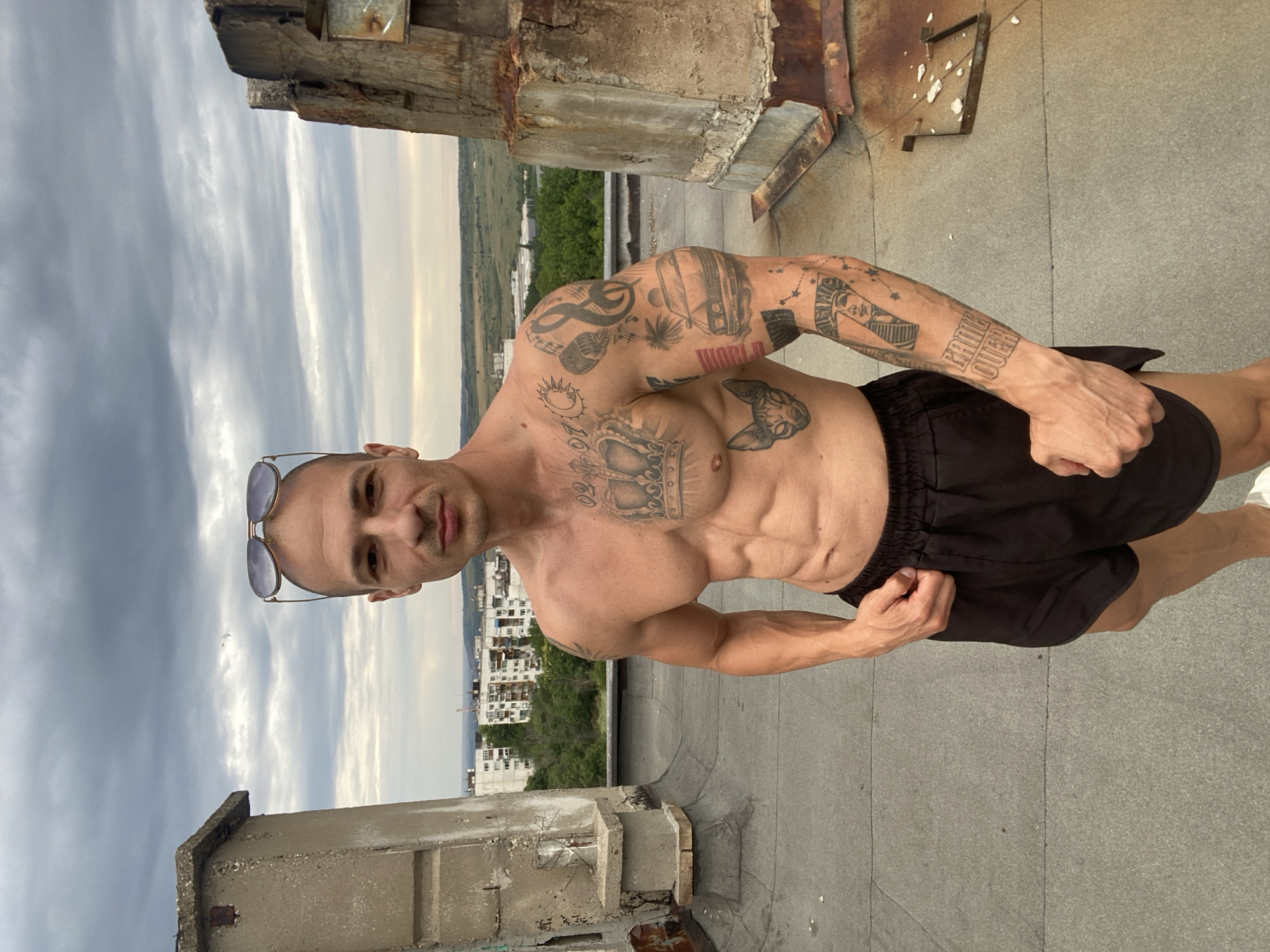 Rooftop moment above Pleven's apartment skyline