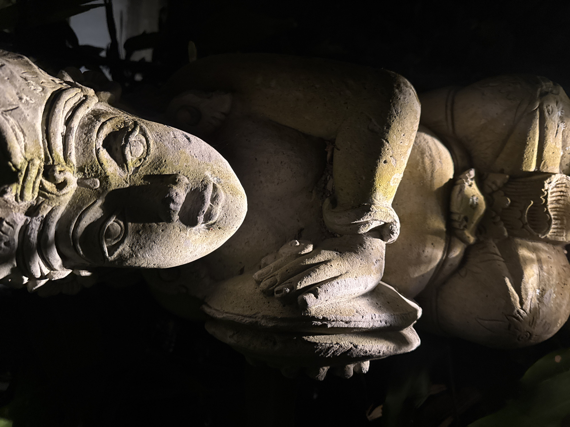 Tourist explores gardens and statues in Kuta Selatan across morning hours
