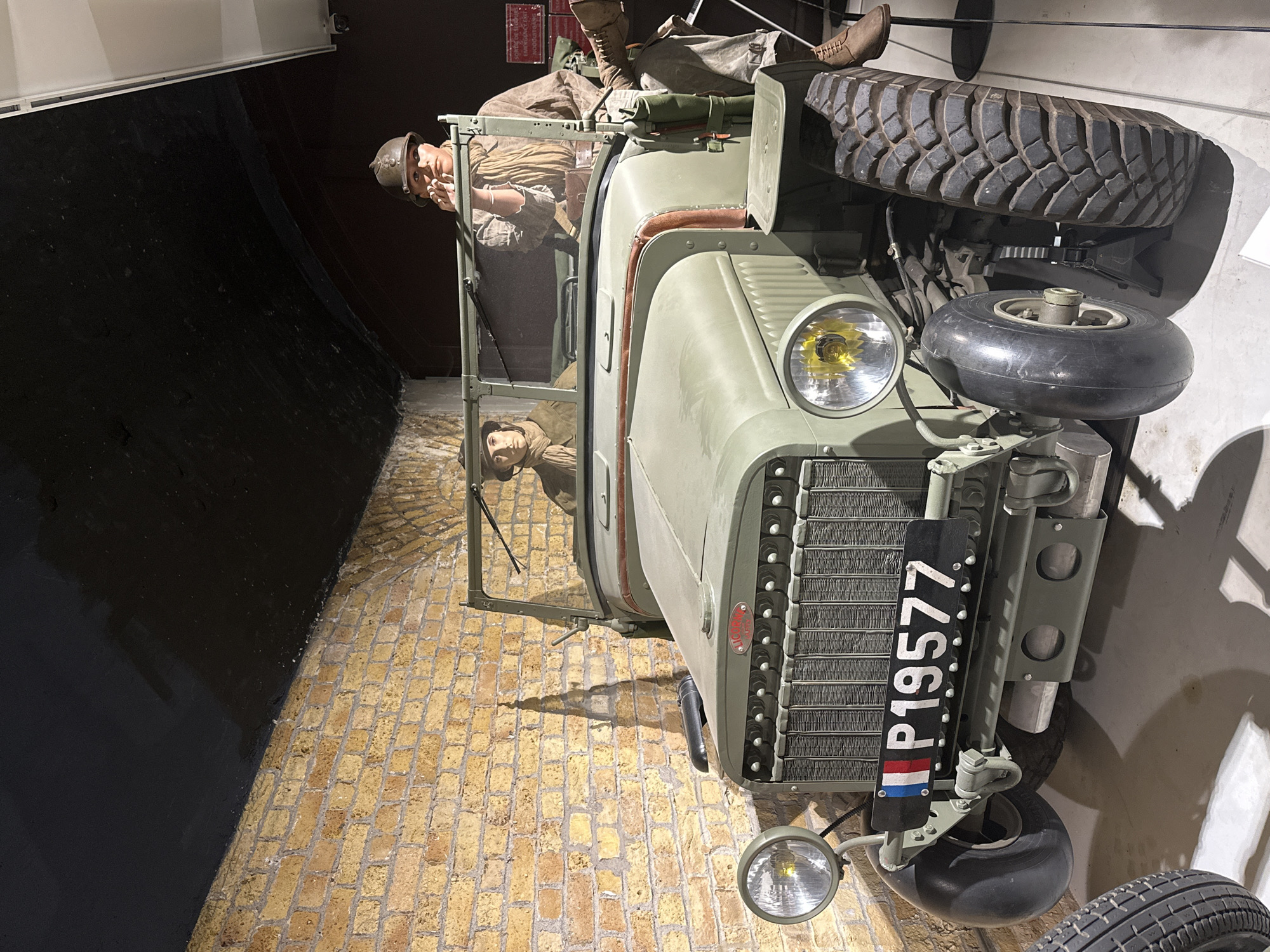 Inside Dunkirk's WWII museum, exploring vehicles, dioramas, and artifacts