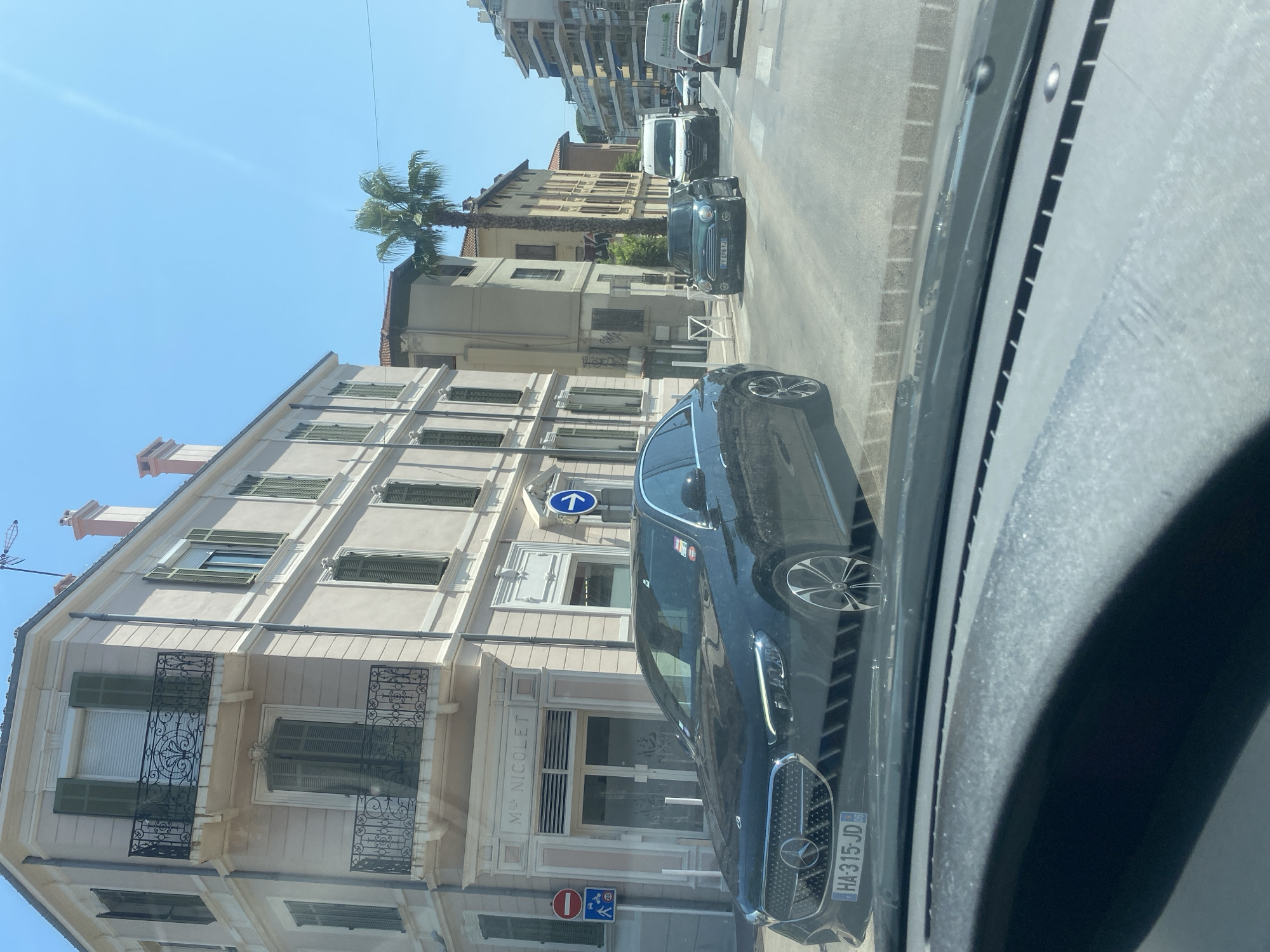 Cruising palm-lined streets through sunny Antibes