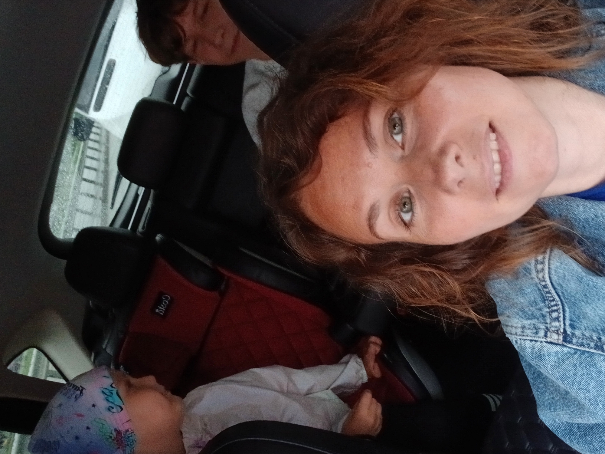 Rainy day selfie inside a car in Yekaterinburg