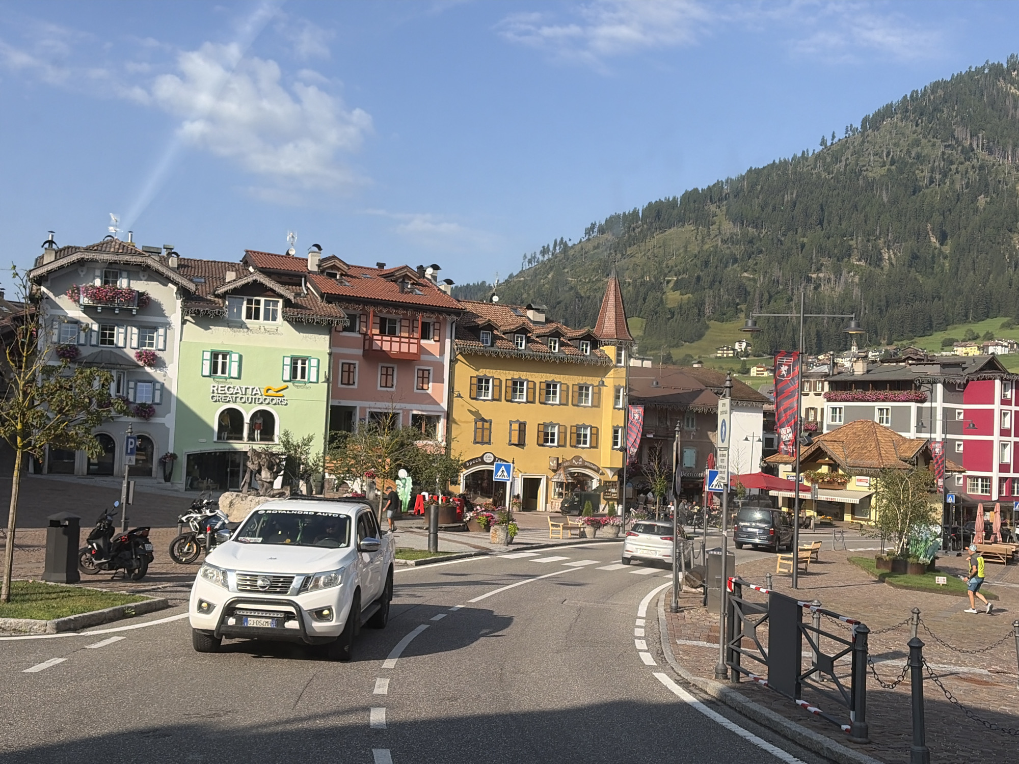 Morning street-level look at Moena, Italy's alpine town center