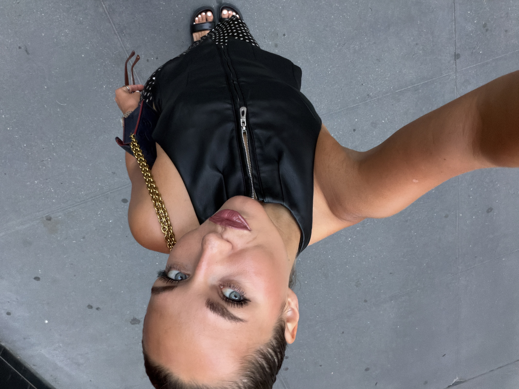 Sidewalk selfie in NYC, two angles